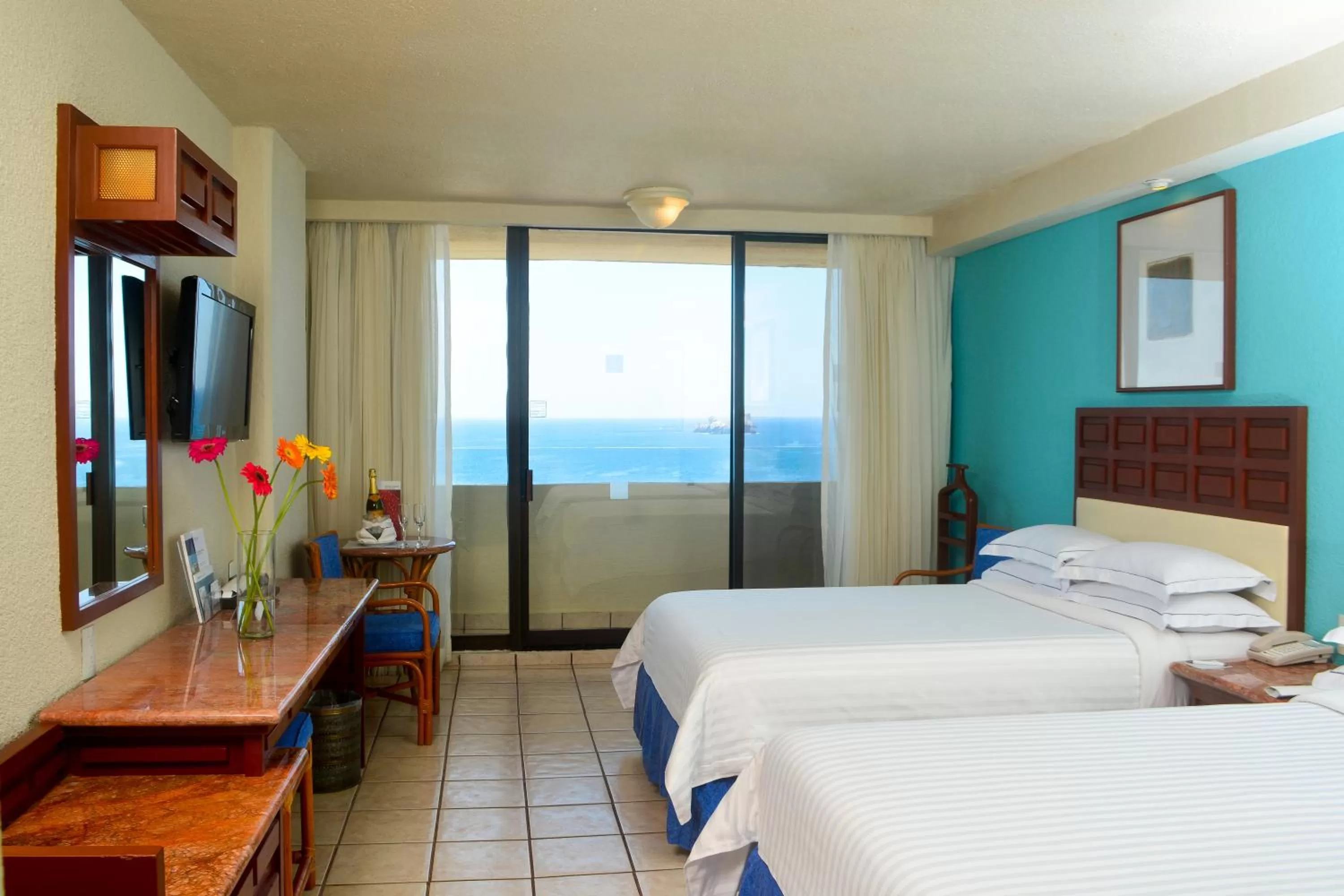 Photo of the whole room, Bed in Barceló Ixtapa - All Inclusive