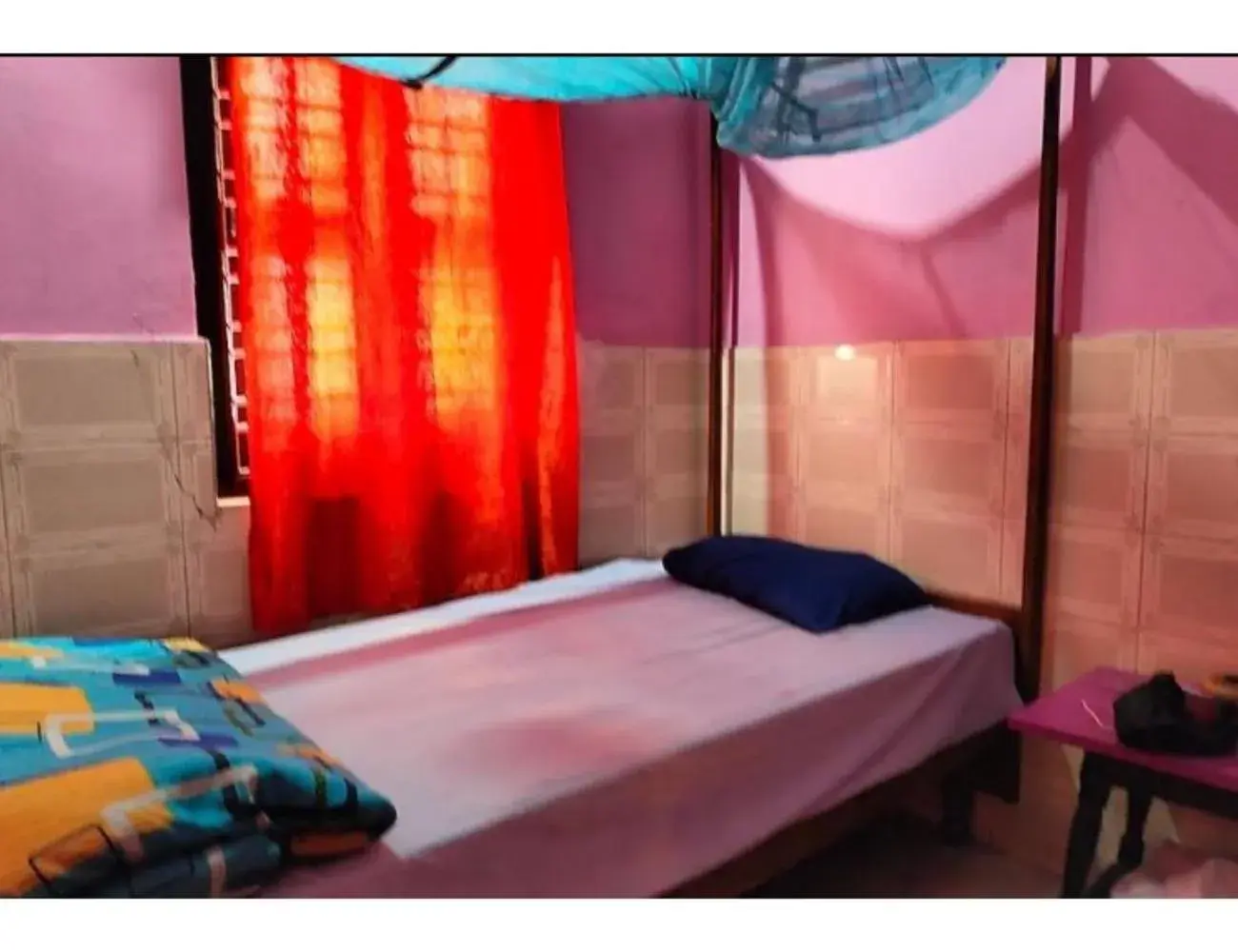 Photo of the whole room, Bed in Goroomgo Central Guest House Agartala