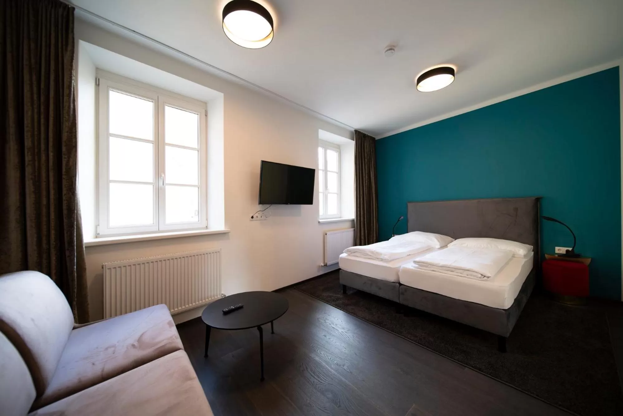 Bed in Blackhome Innsbruck Boutique I contactless check-in