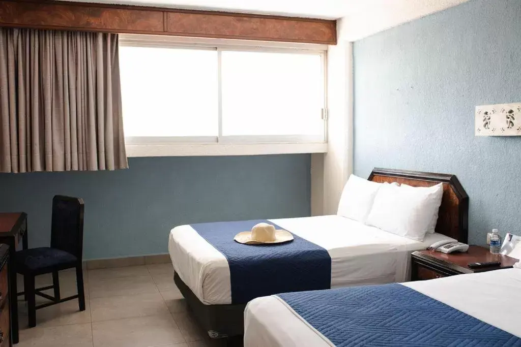 Bed in Hotel Los Aluxes