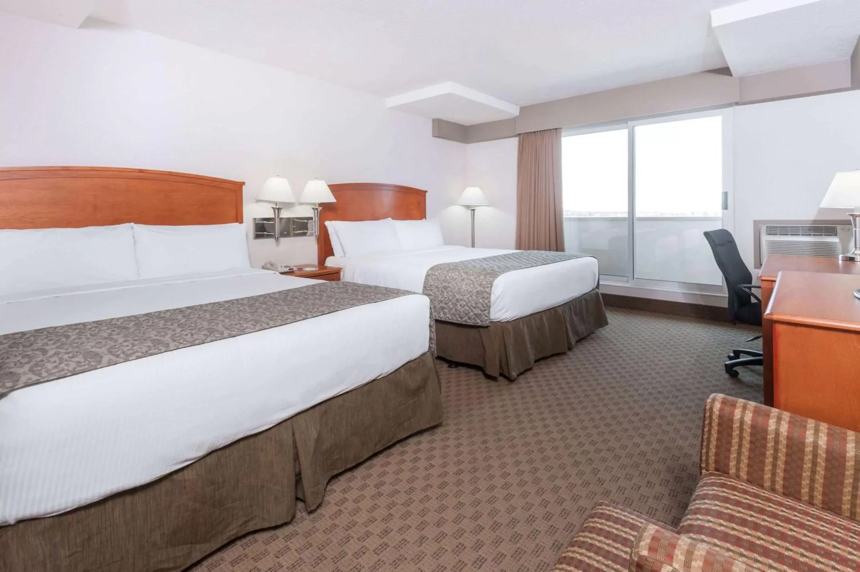 Bedroom, Bed in Ramada by Wyndham Edmonton South