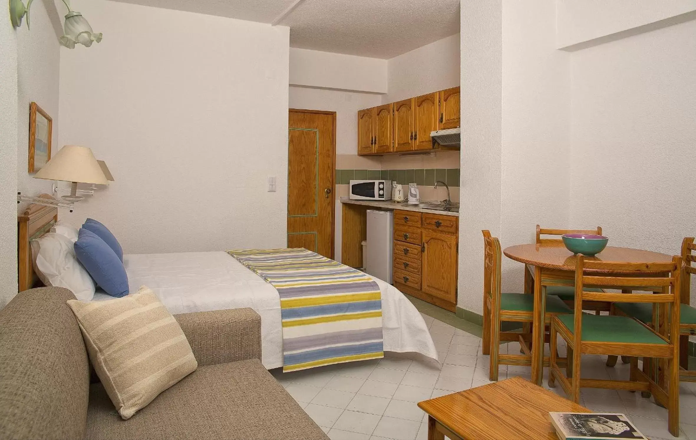 Bed in Ourabay Hotel Apartamento - Art & Holidays