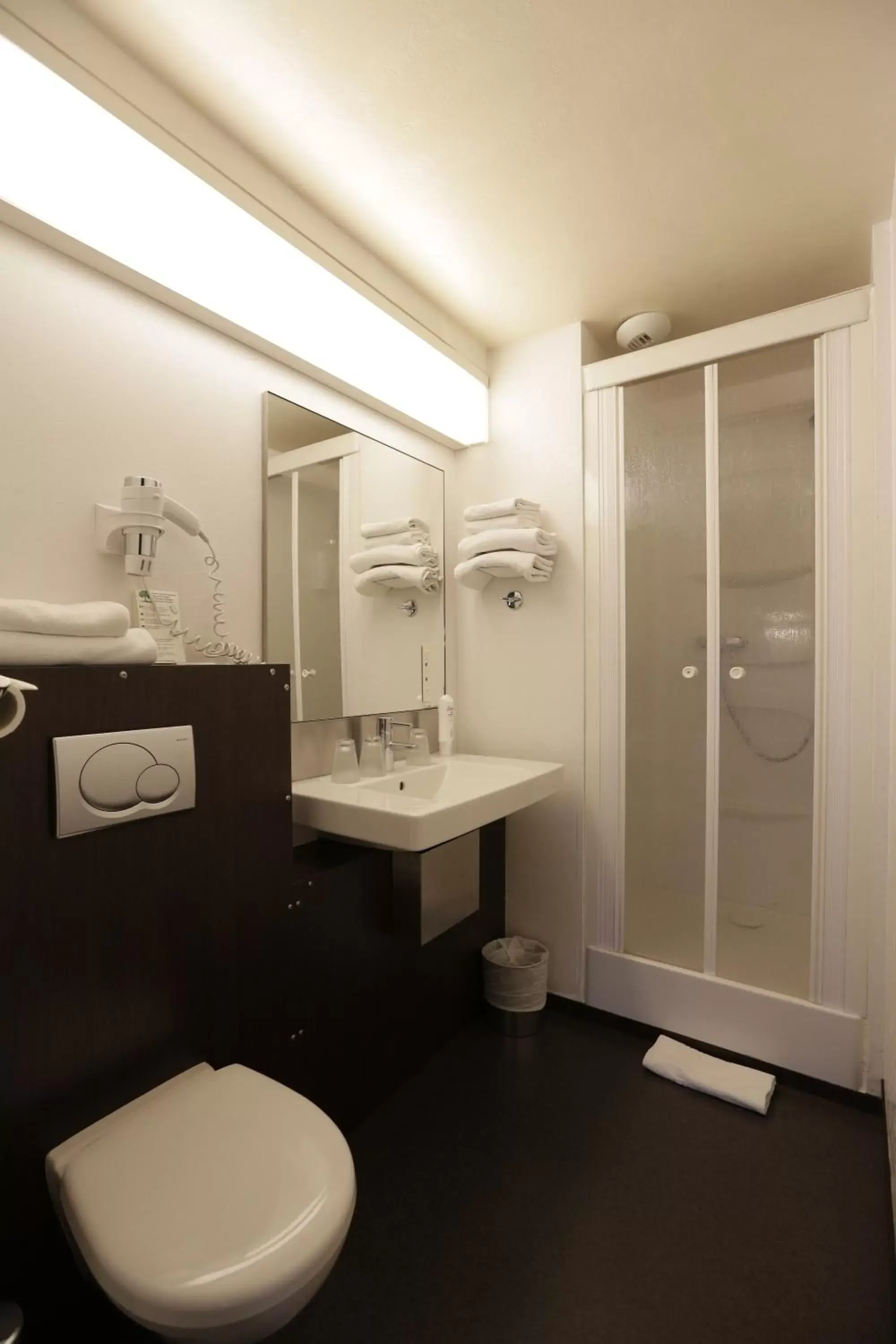 Bathroom in Hôtel Au Petit Caporal