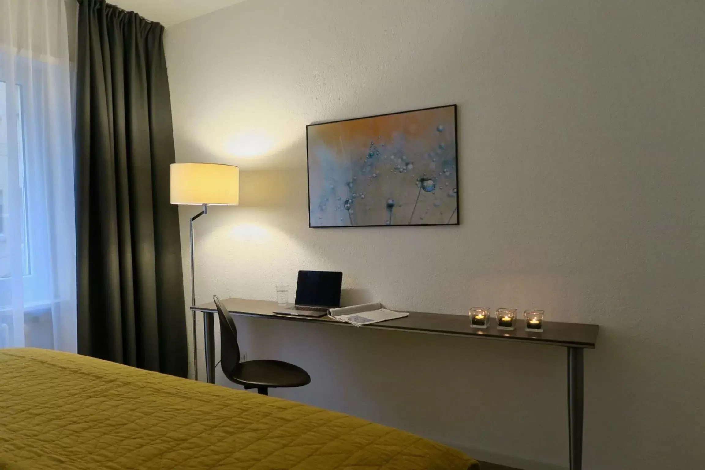 Bedroom, TV/Entertainment Center in Zurich Furnished Homes