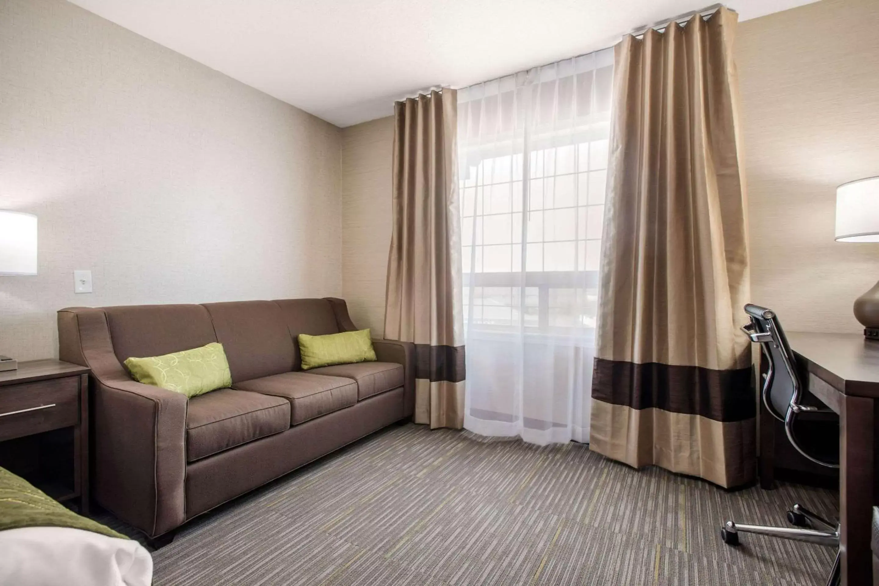 Photo of the whole room, Seating Area in Comfort Inn & Suites Red Deer