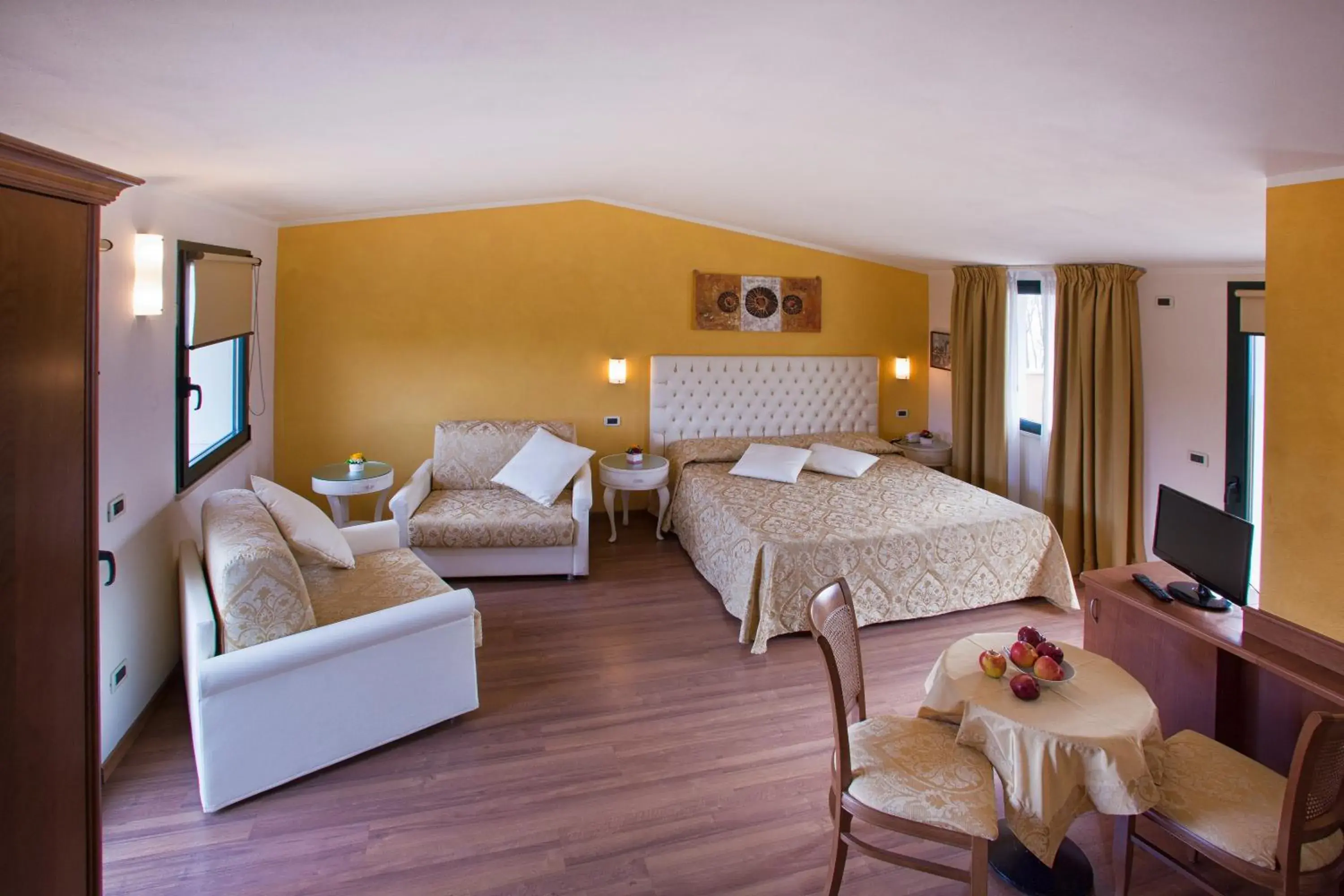 Bedroom in Hotel La Rondine