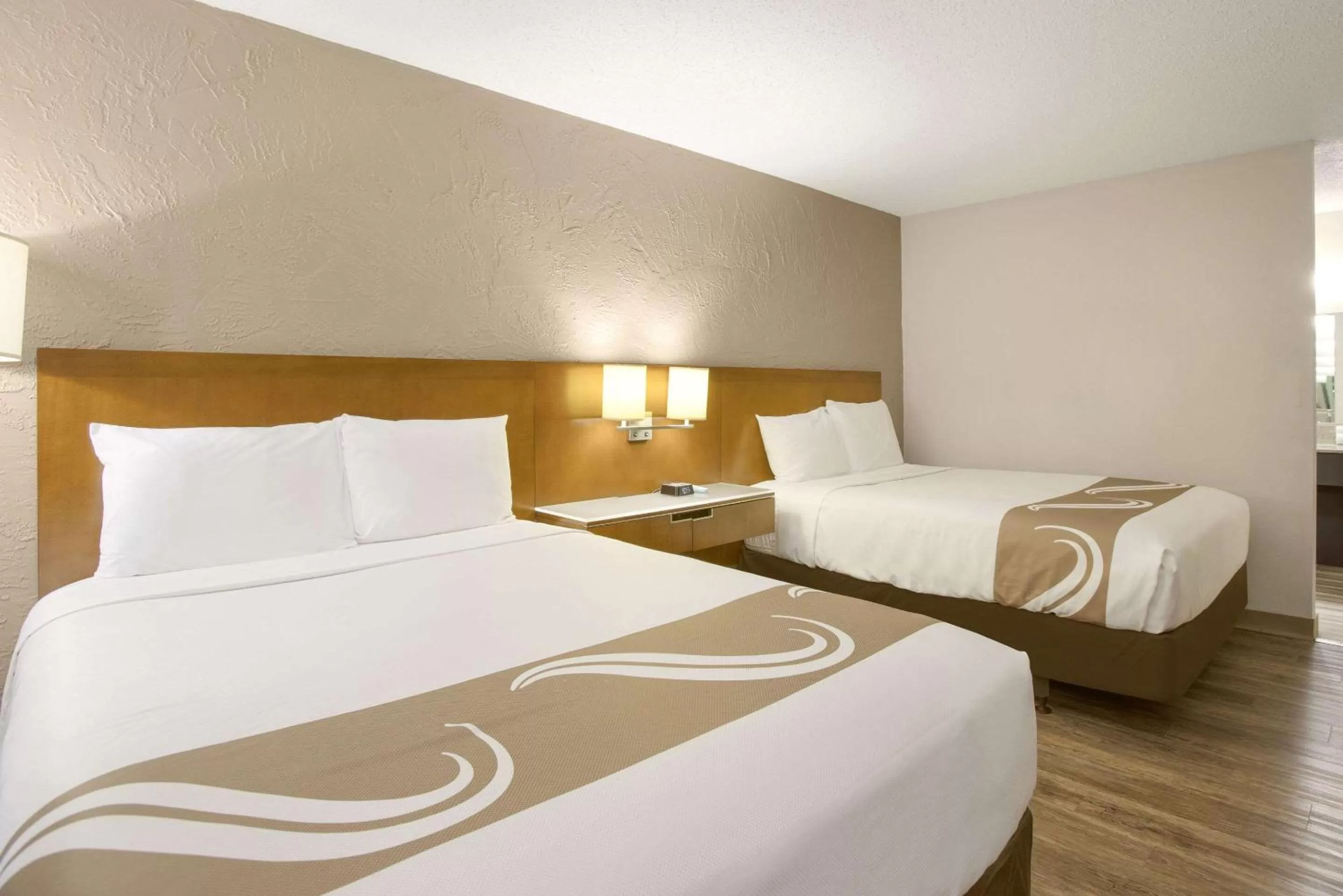 Bedroom, Bed in Rodeway Inn & Suites Grand Rapids Southeast