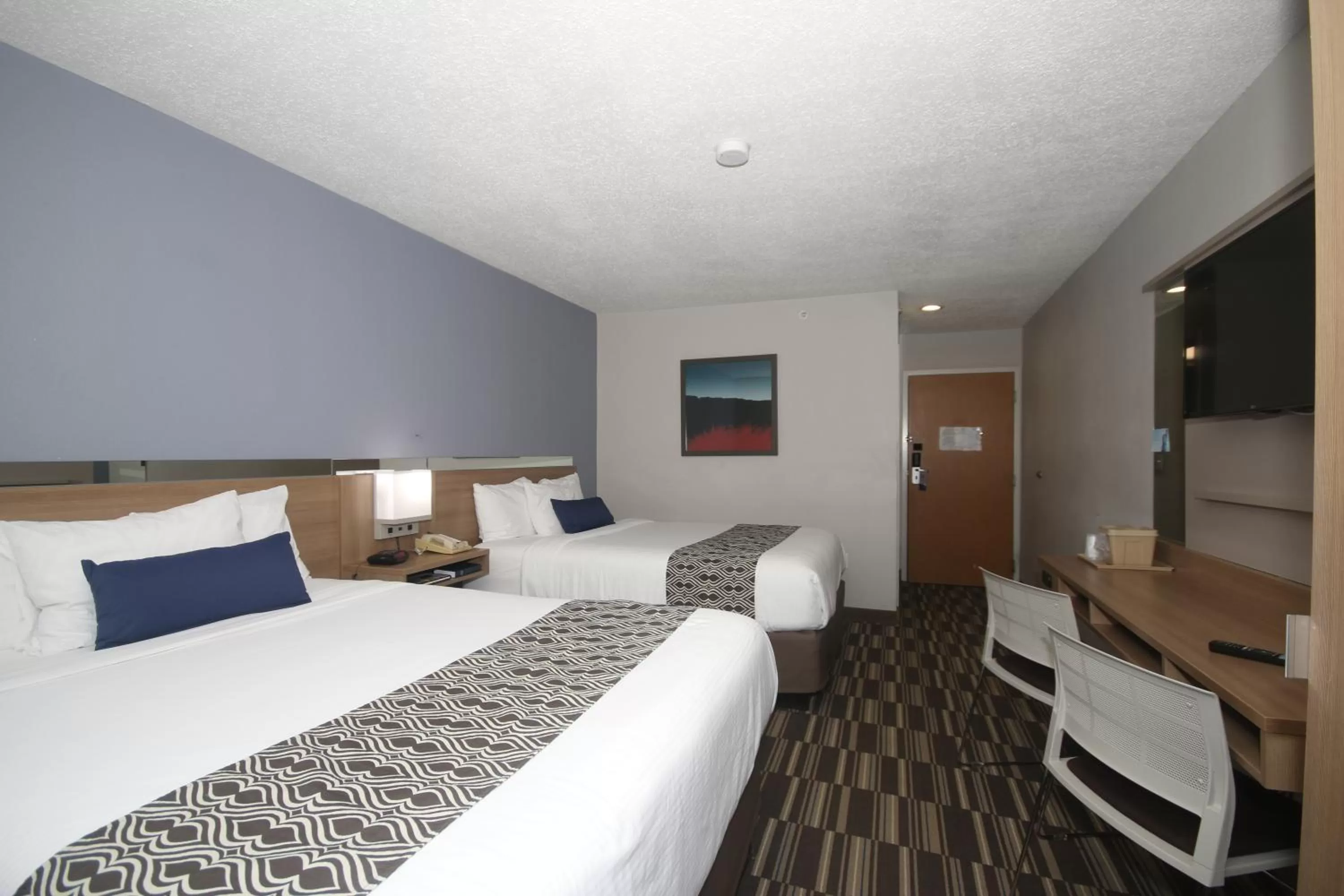 Photo of the whole room, Bed in Microtel Inn by Wyndham Greensboro