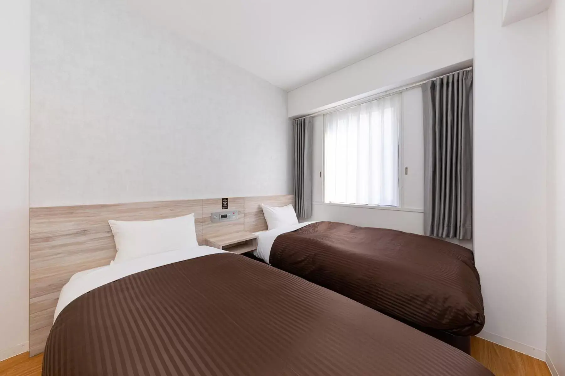 Photo of the whole room, Bed in The OneFive Fukuoka Tenjin