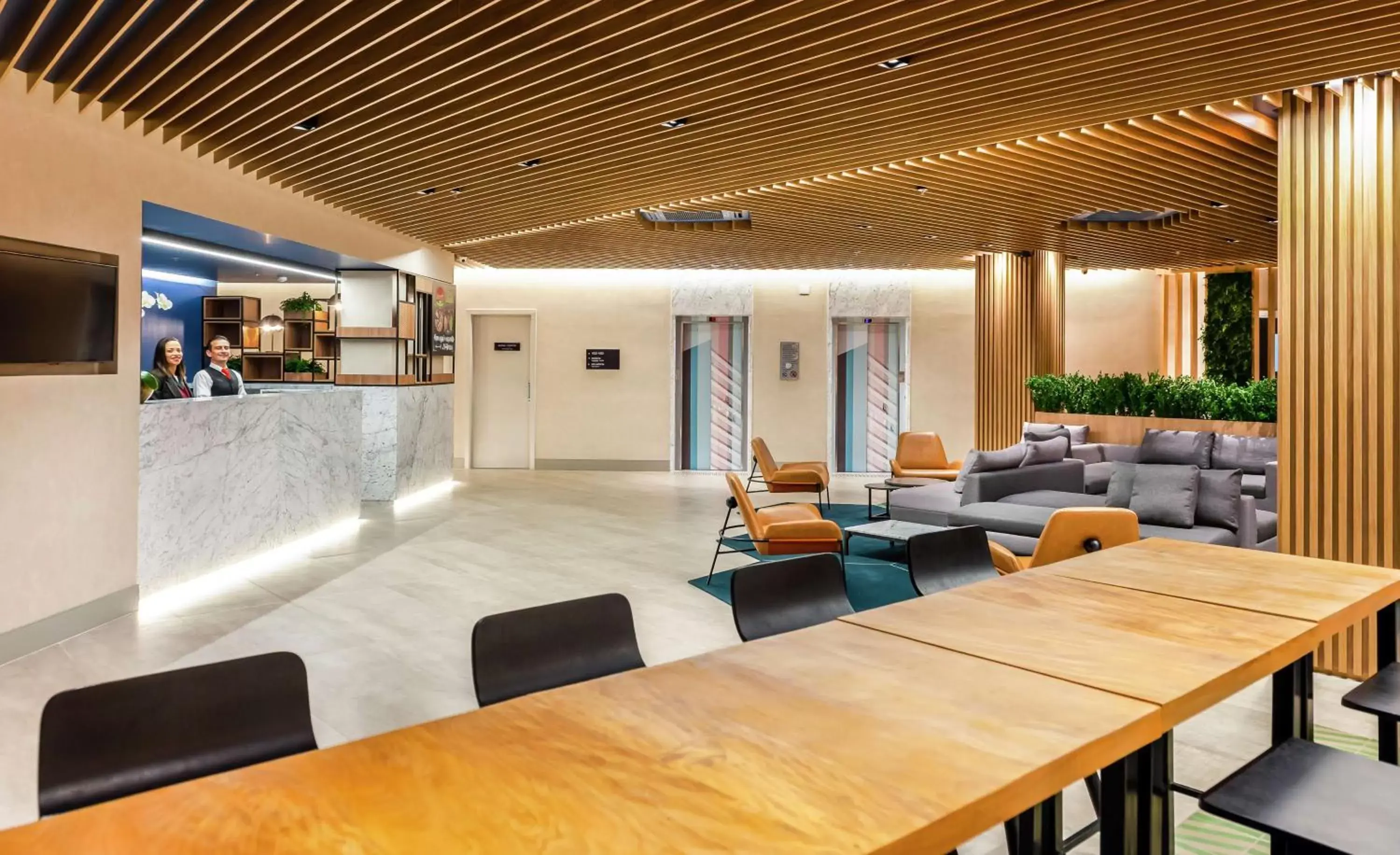 Lobby or reception in Hampton by Hilton Guarulhos Airport Lobby or reception in Hampton by Hilton Guarulhos Airport