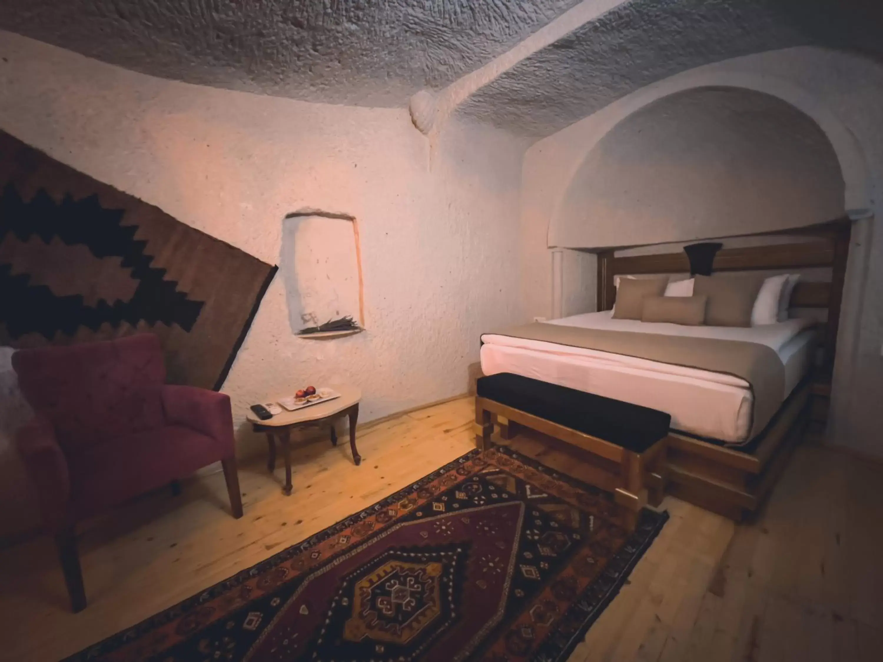 Bed in Local Cave House Hotel