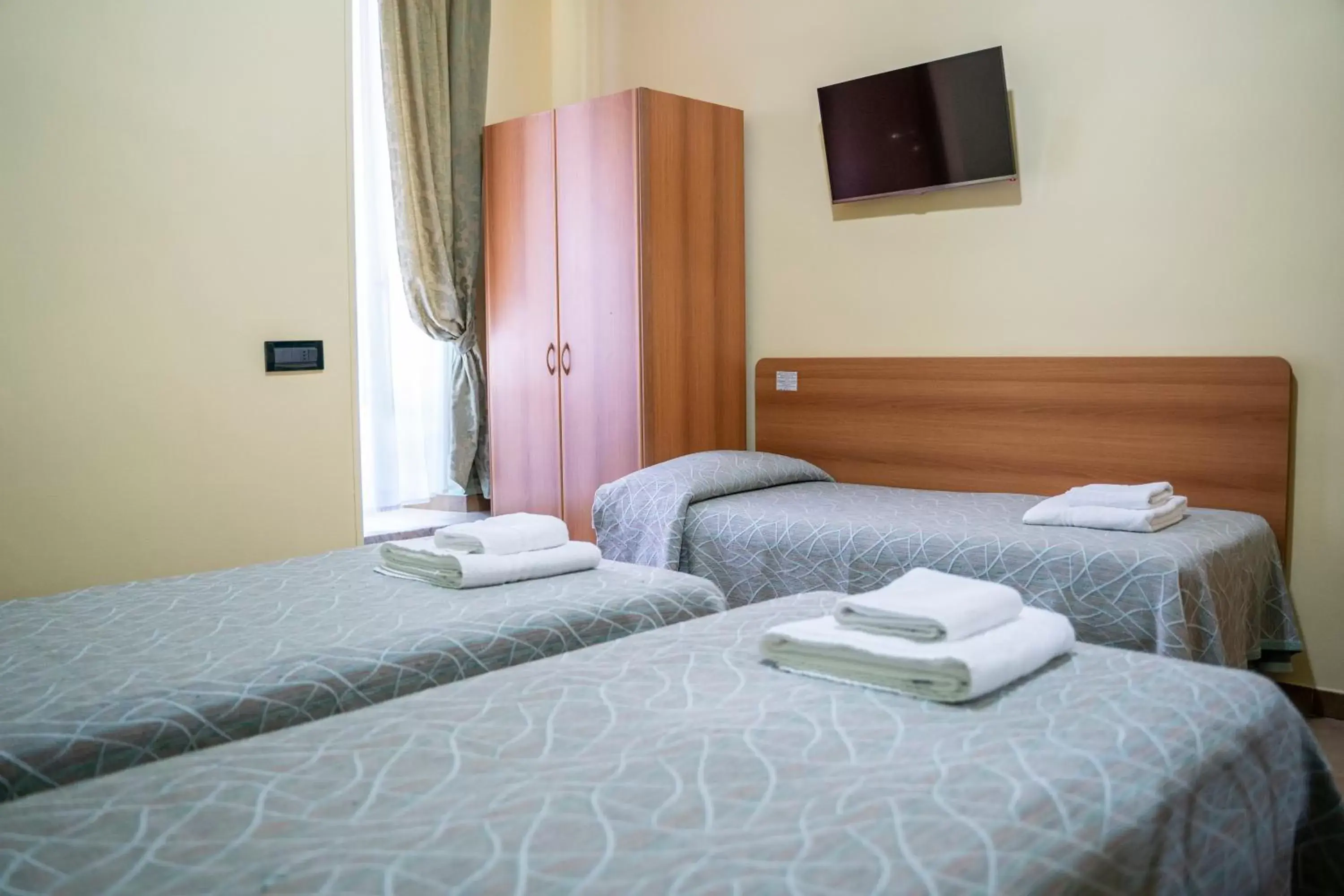 Bed in Hotel Ferrarese