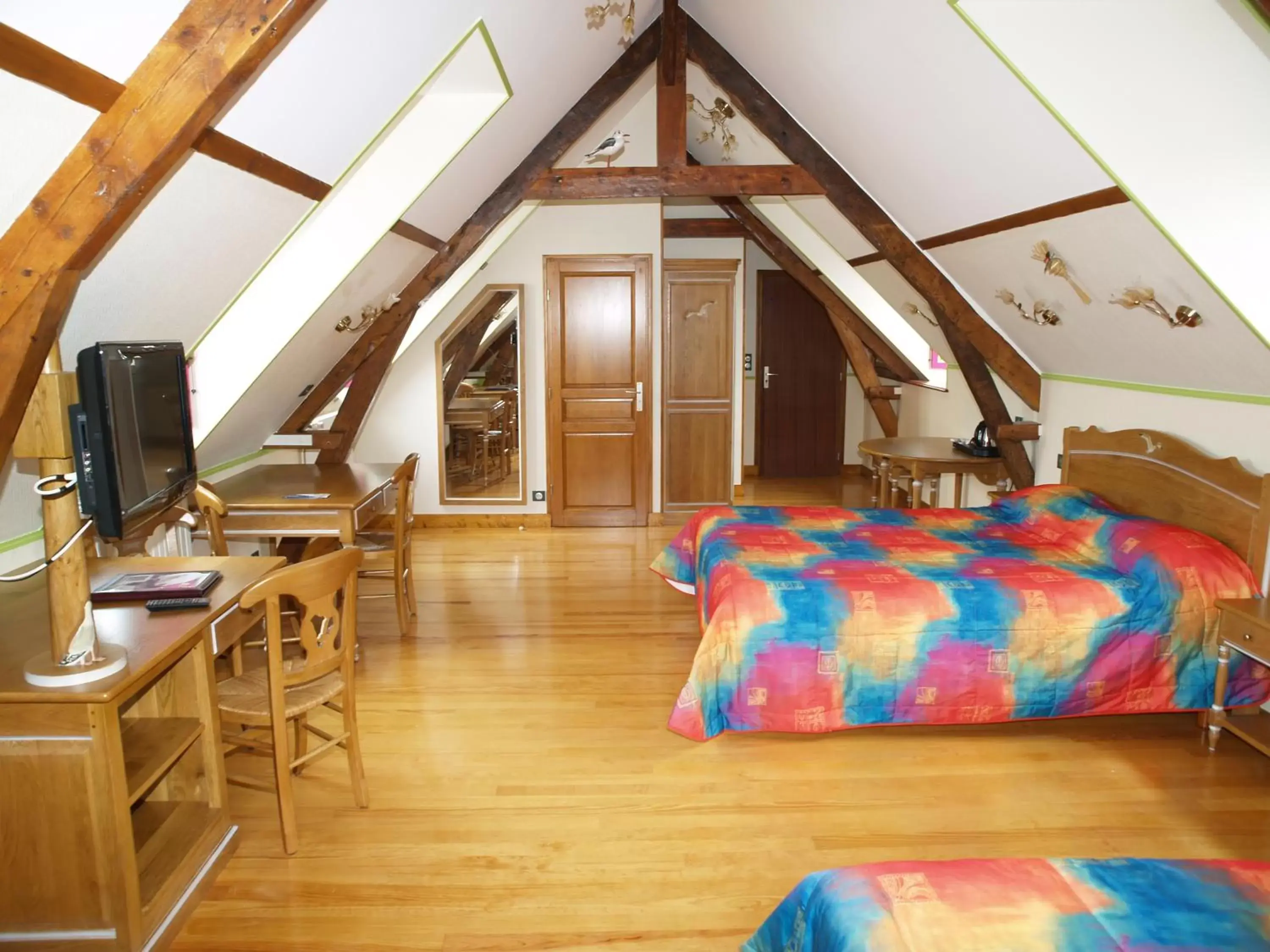 Bedroom in Hôtel De Calais