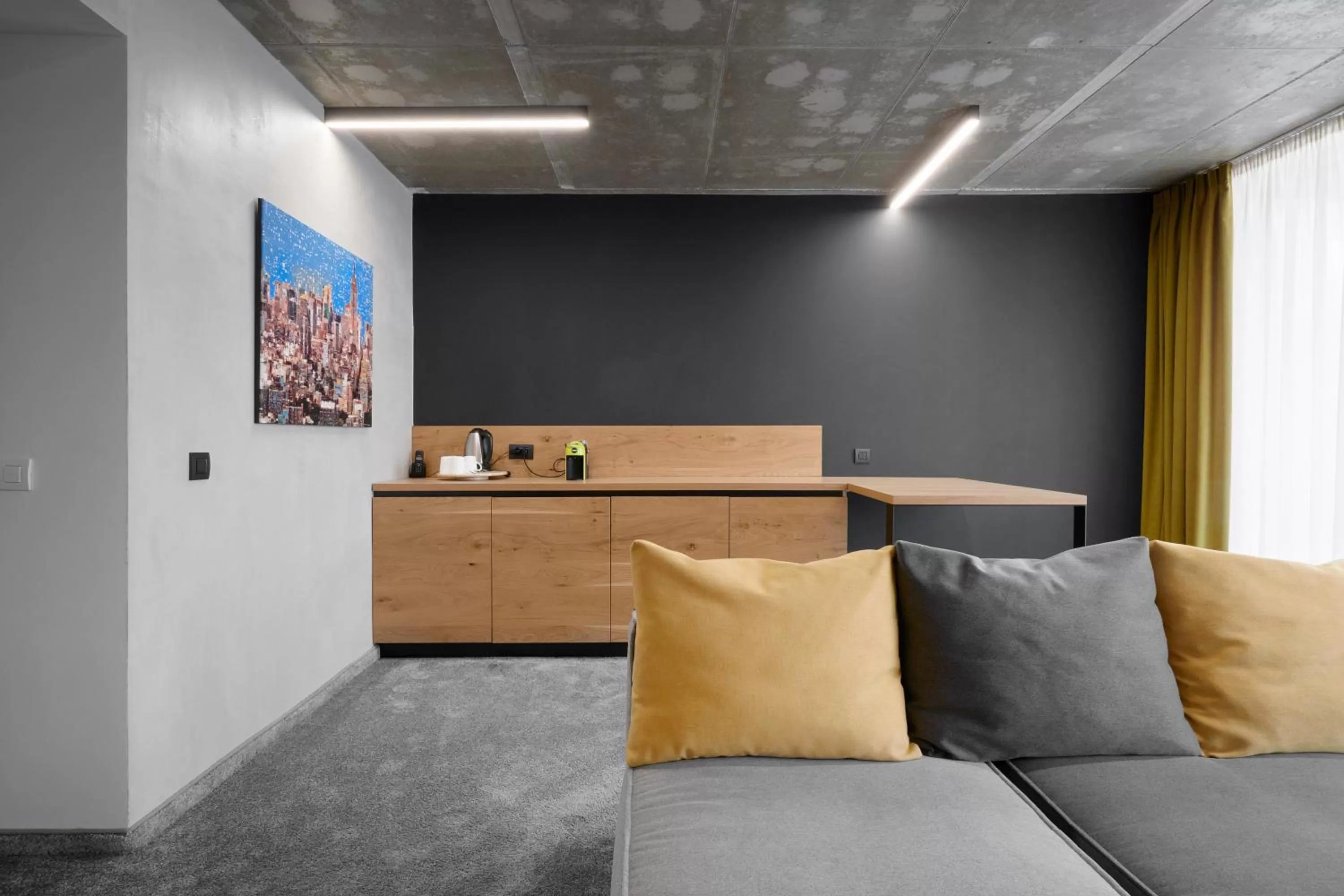 Living room in Adella Boutique Hotel - Free Secured Parking