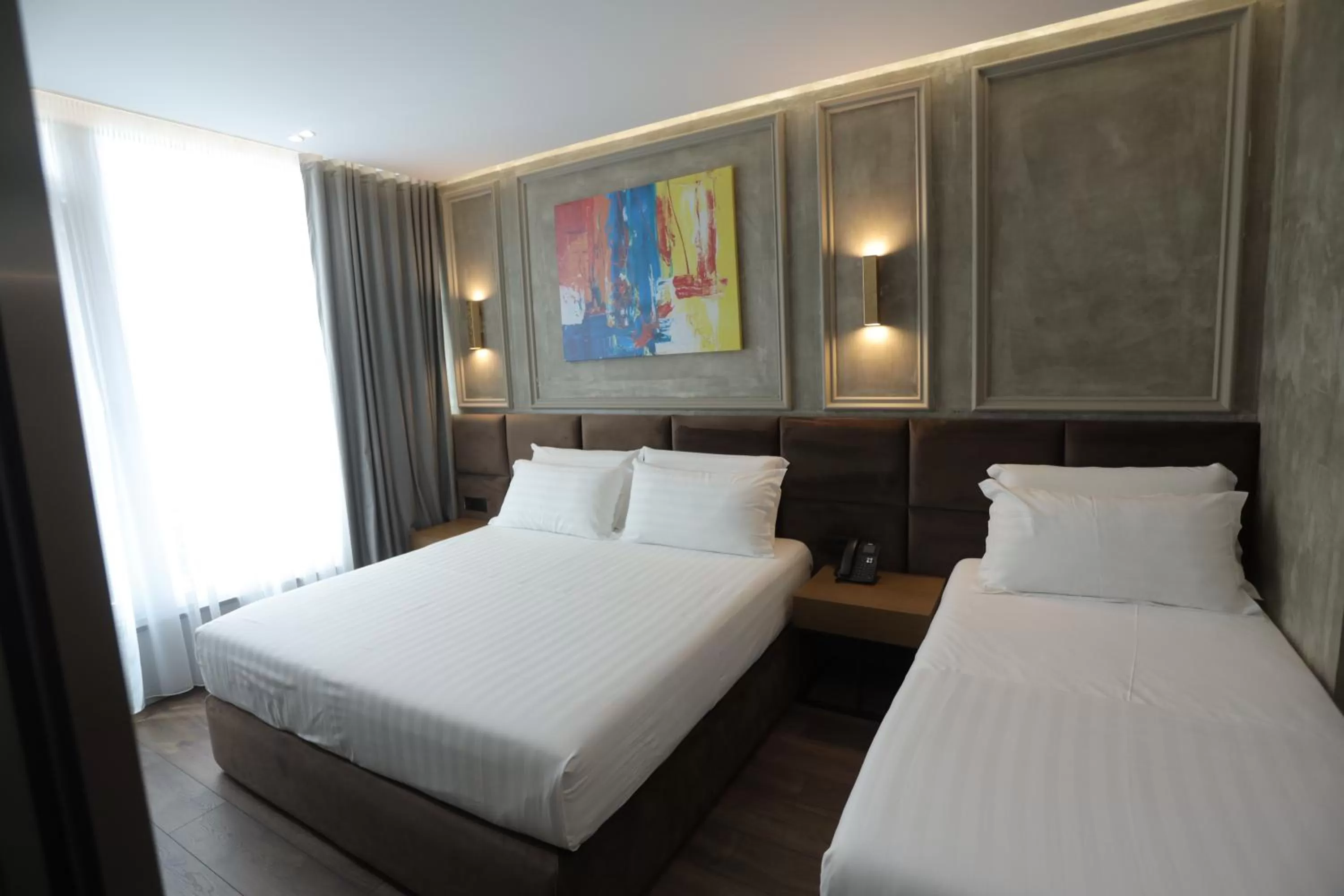 Bed in AP Hotel Boutique