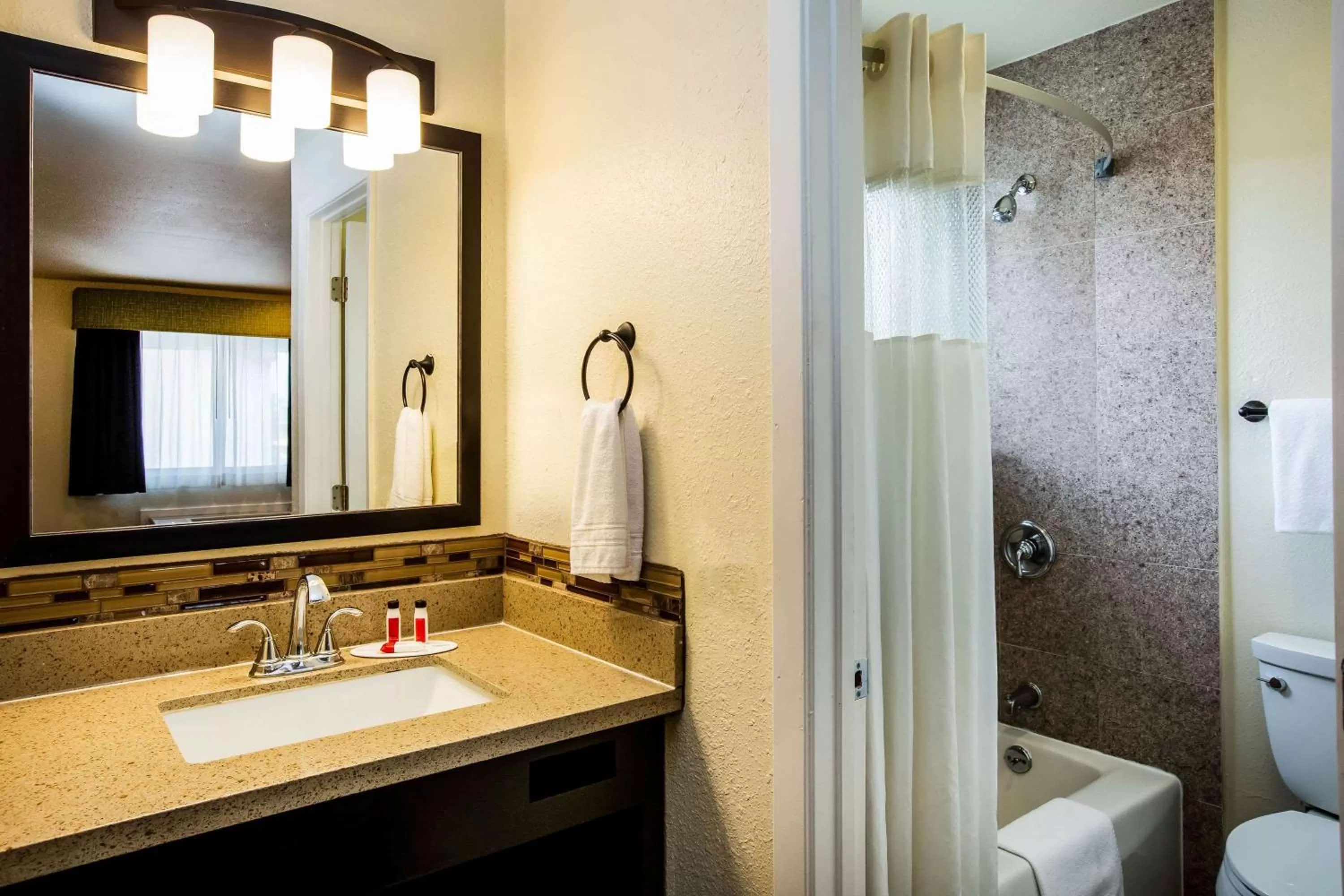 Bathroom in Days Inn by Wyndham Monterey Downtown