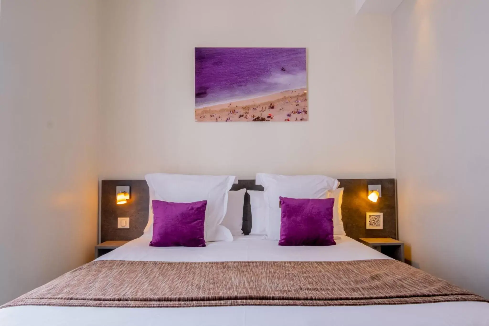 Bed in Hôtel de la Fontaine Bed in Hôtel de la Fontaine