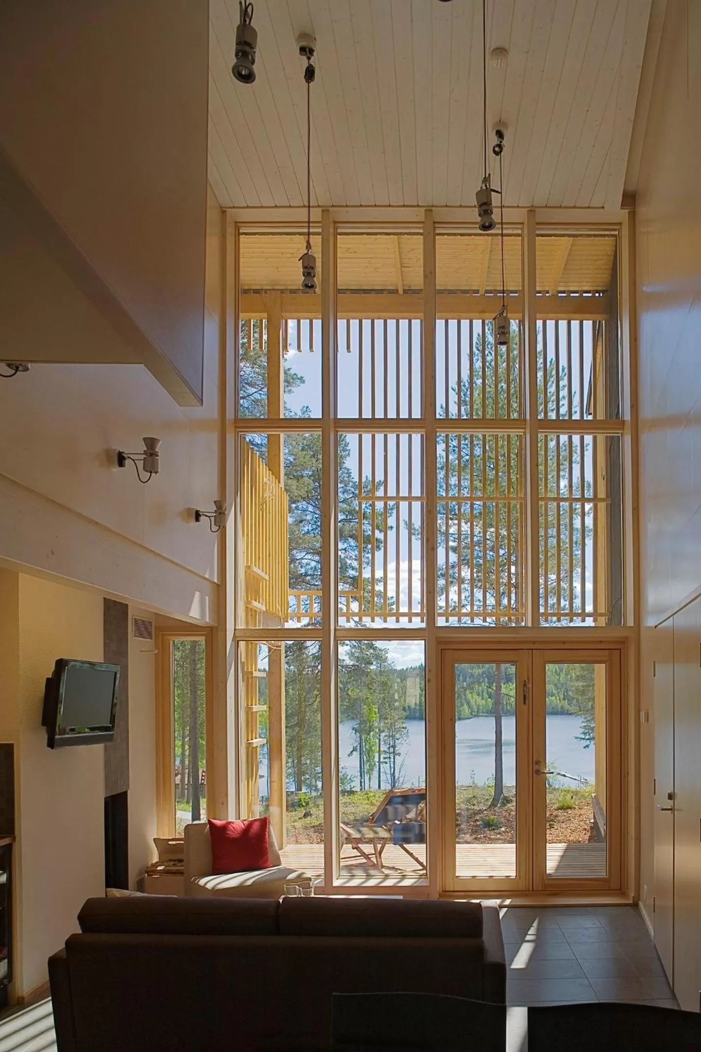 Seating area in Saimaanranta Resort by Anttolanhovi