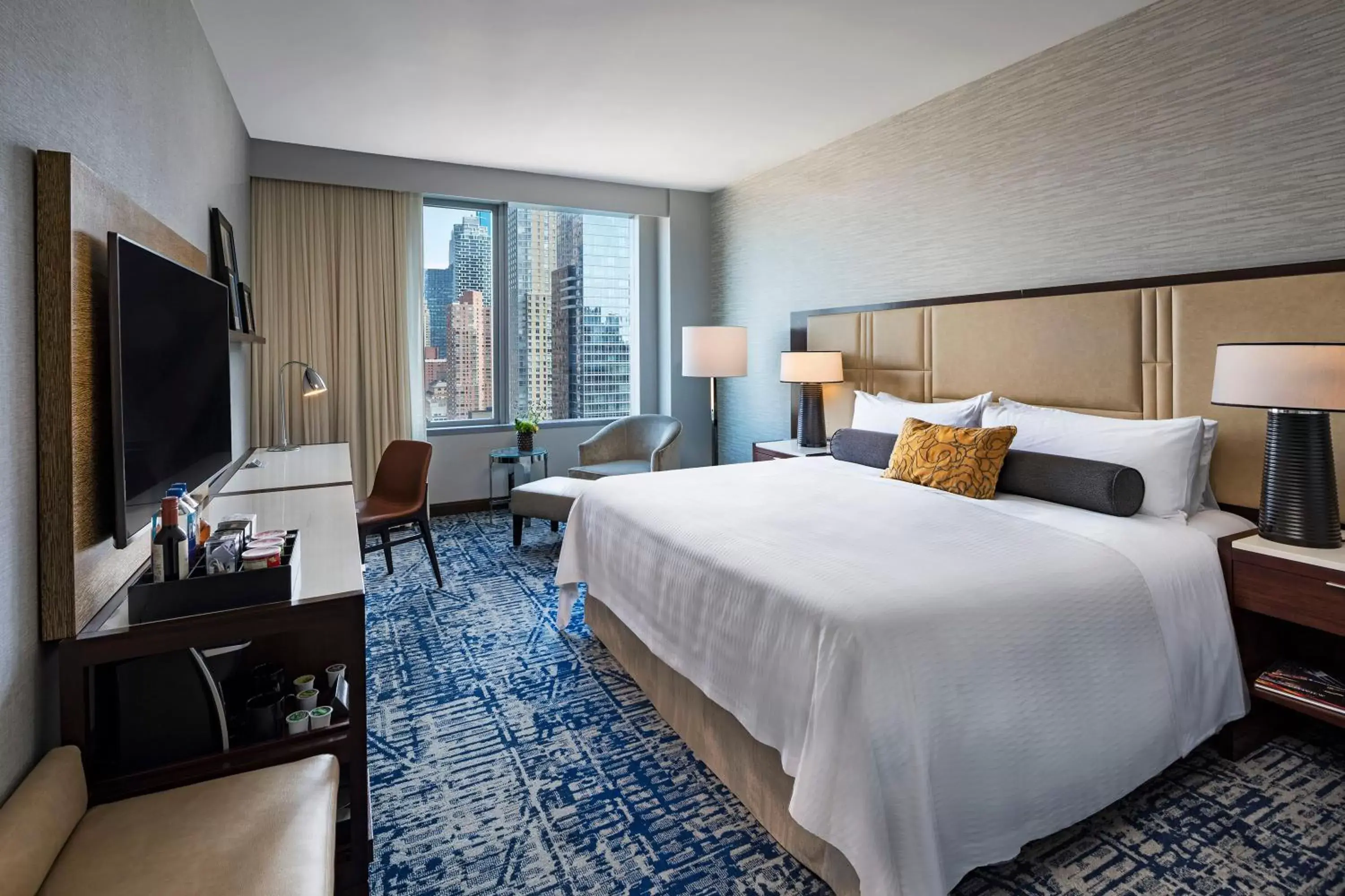 Guests, Bed in InterContinental New York Times Square by IHG Guests, Bed in InterContinental New York Times Square by IHG