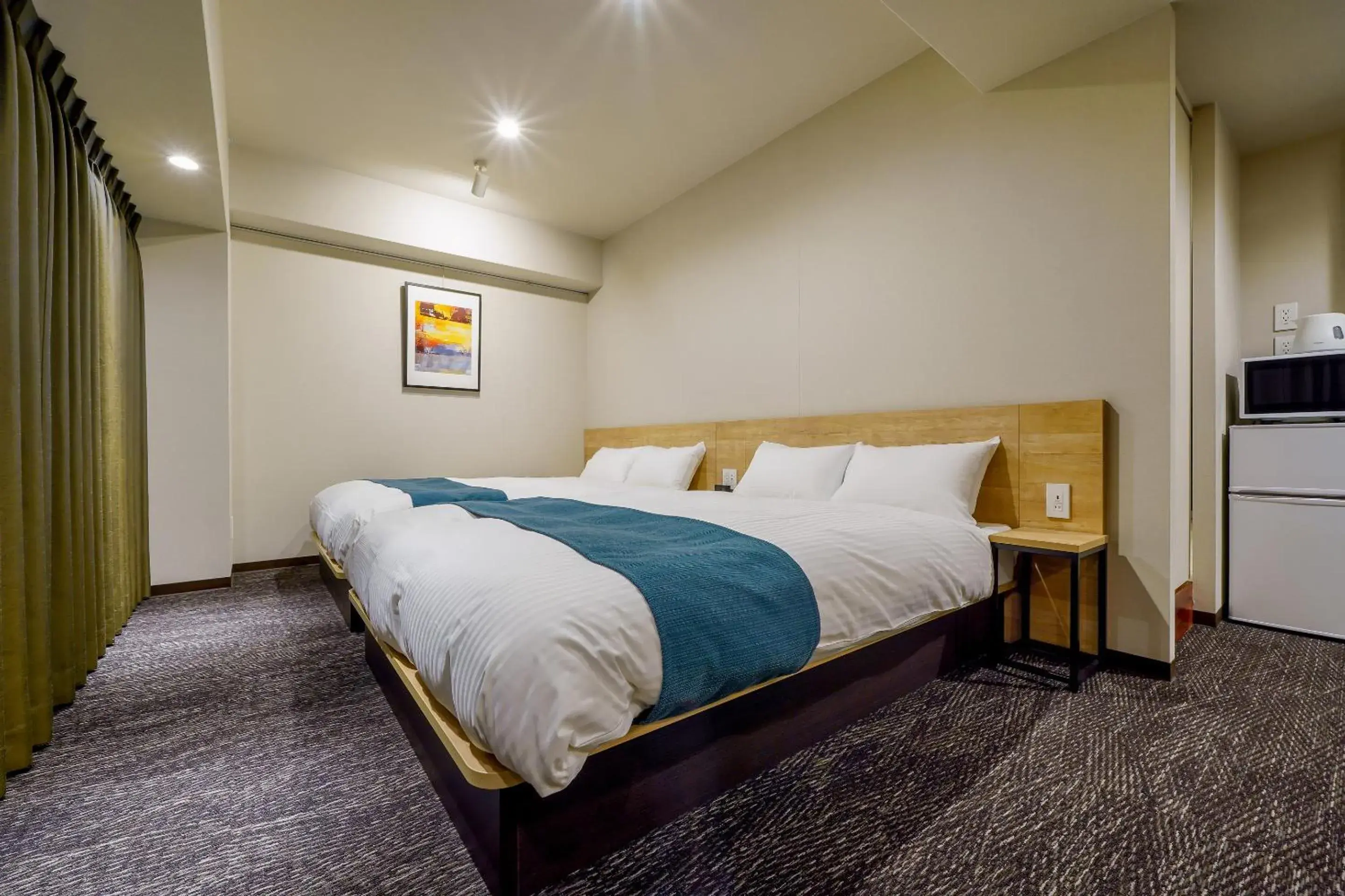 Bed in RESI STAY cotorune KYOTO