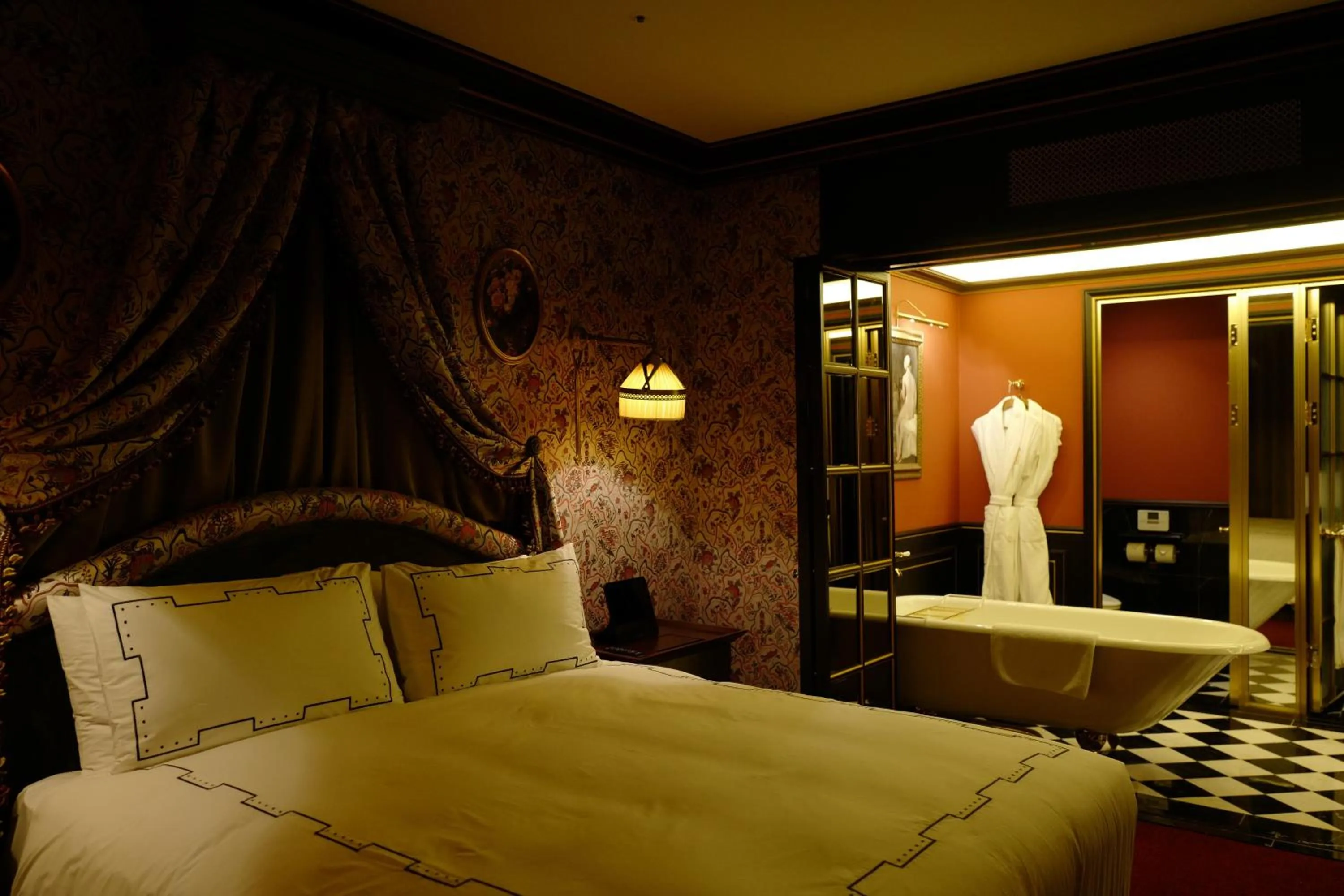 Bedroom in L'Escape Hotel