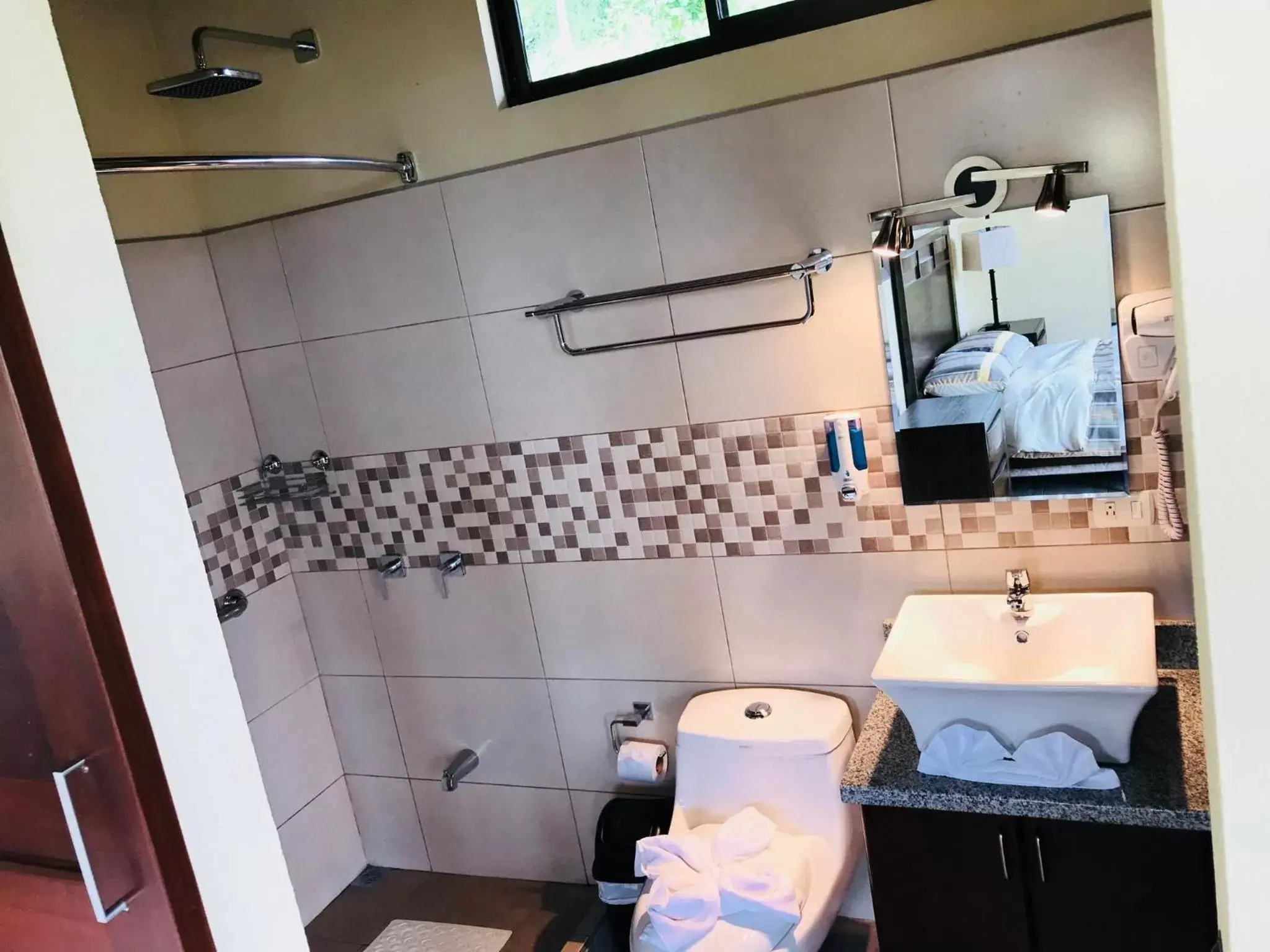Bathroom in Arenal Roca Suites