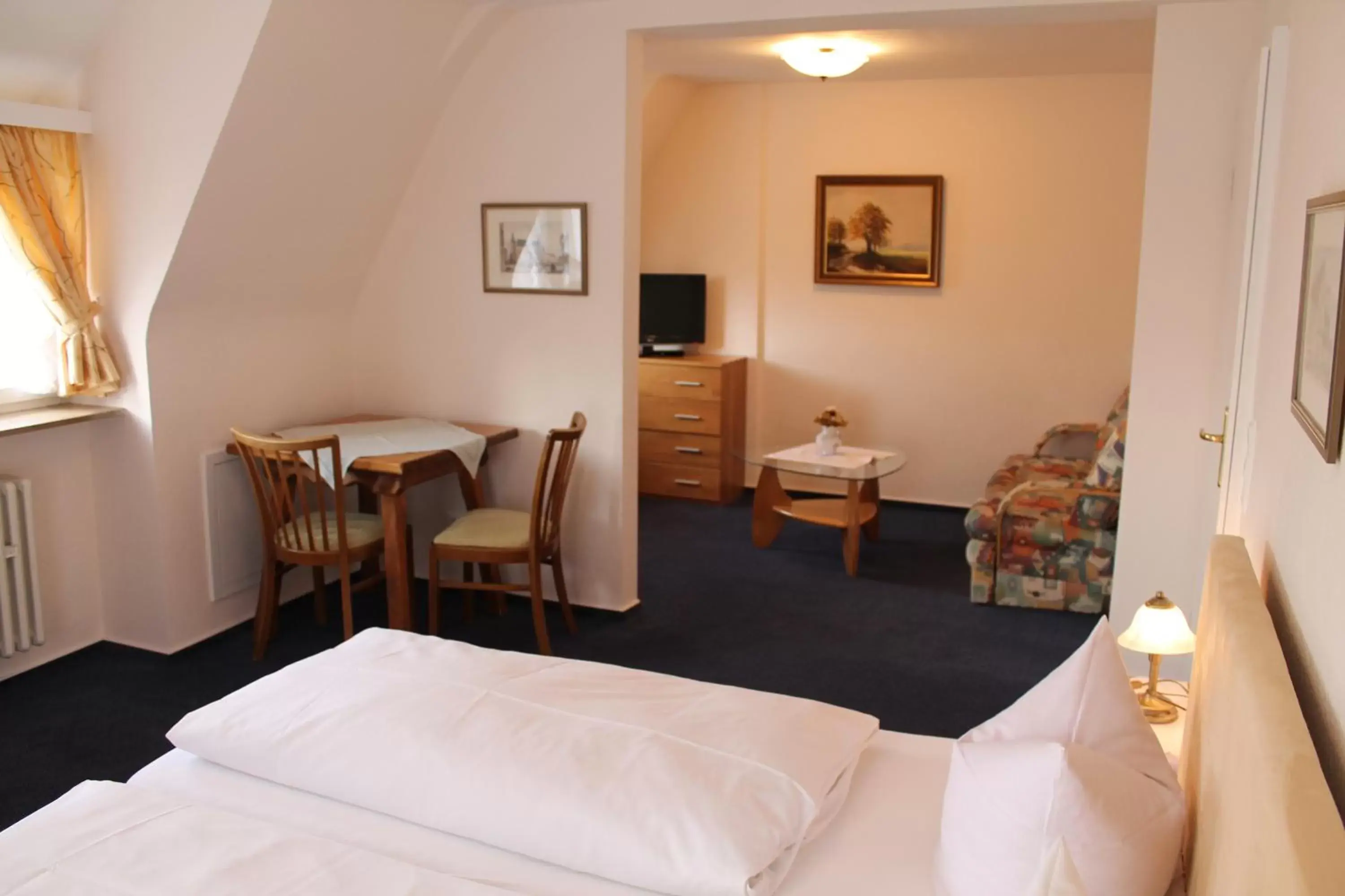 Bedroom, Seating Area in Hotel Zum Breiterle