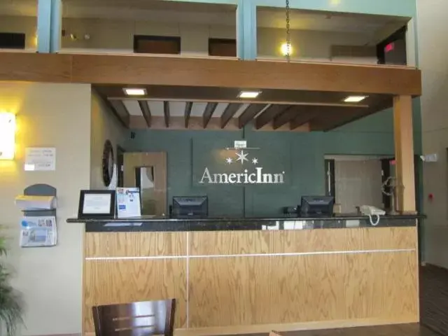 Lobby or reception in AmericInn by Wyndham West Bend