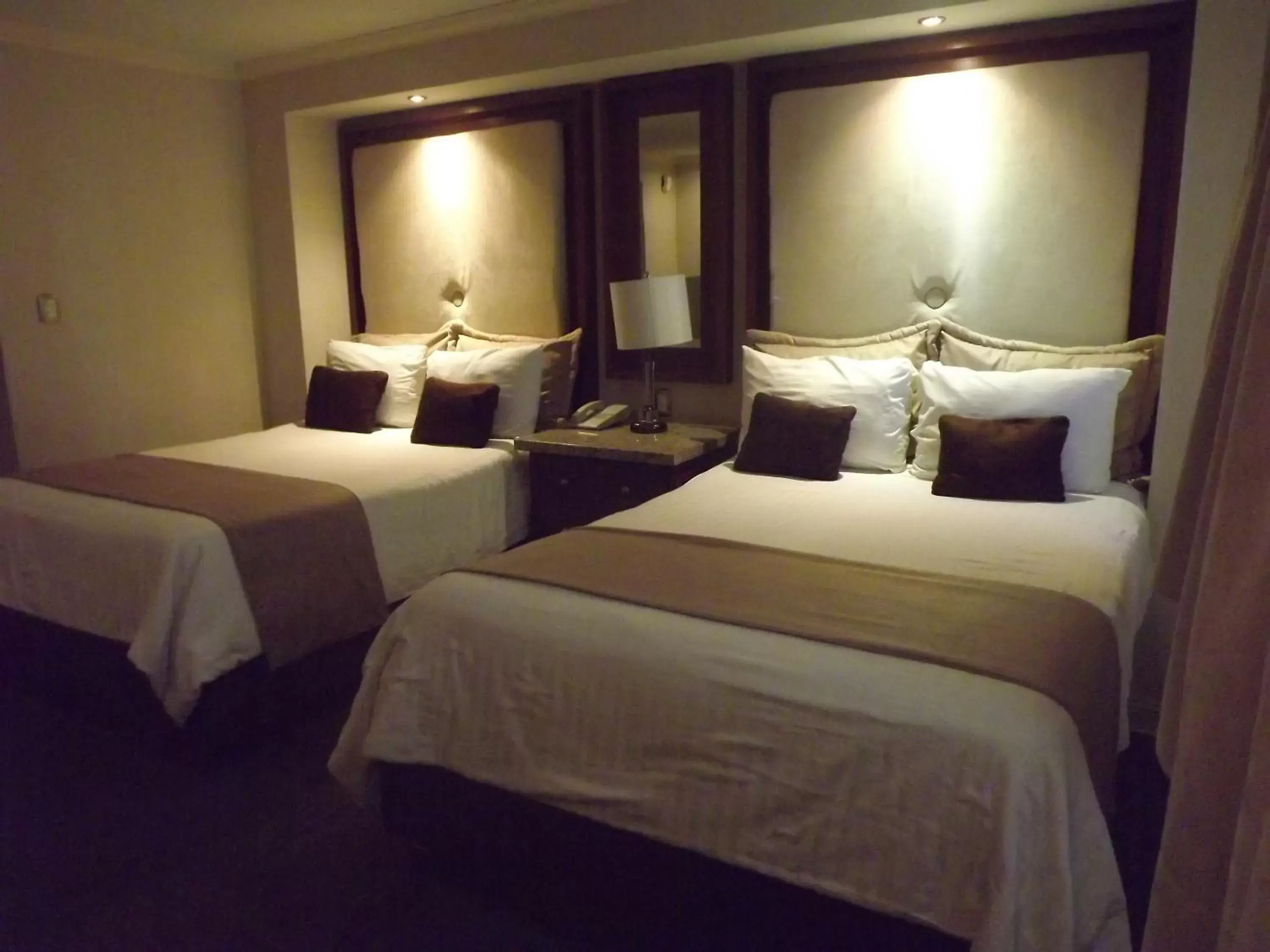 Bed in Rose Hotel