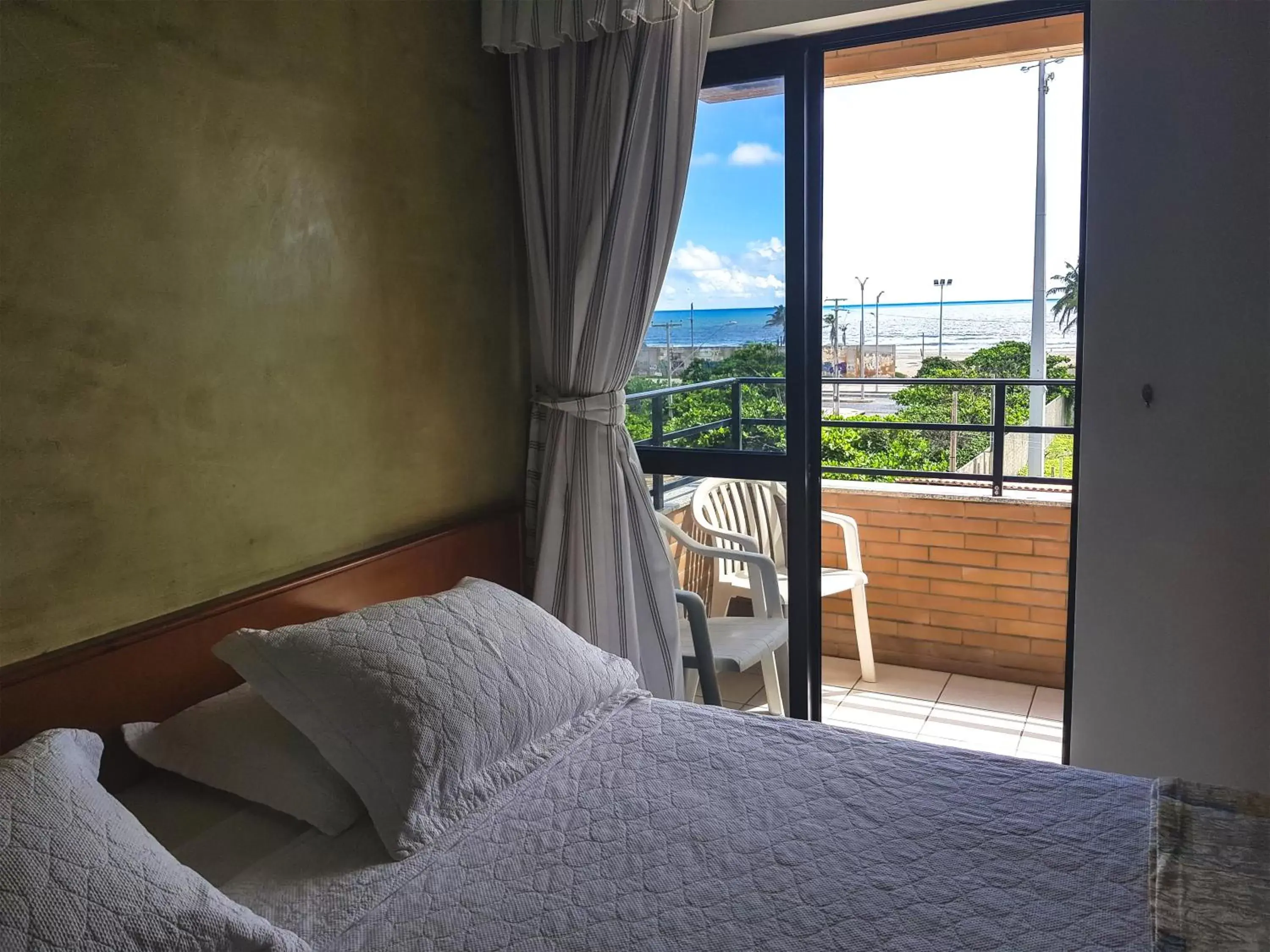 Balcony/Terrace, Bed in Golden Beach Hotel