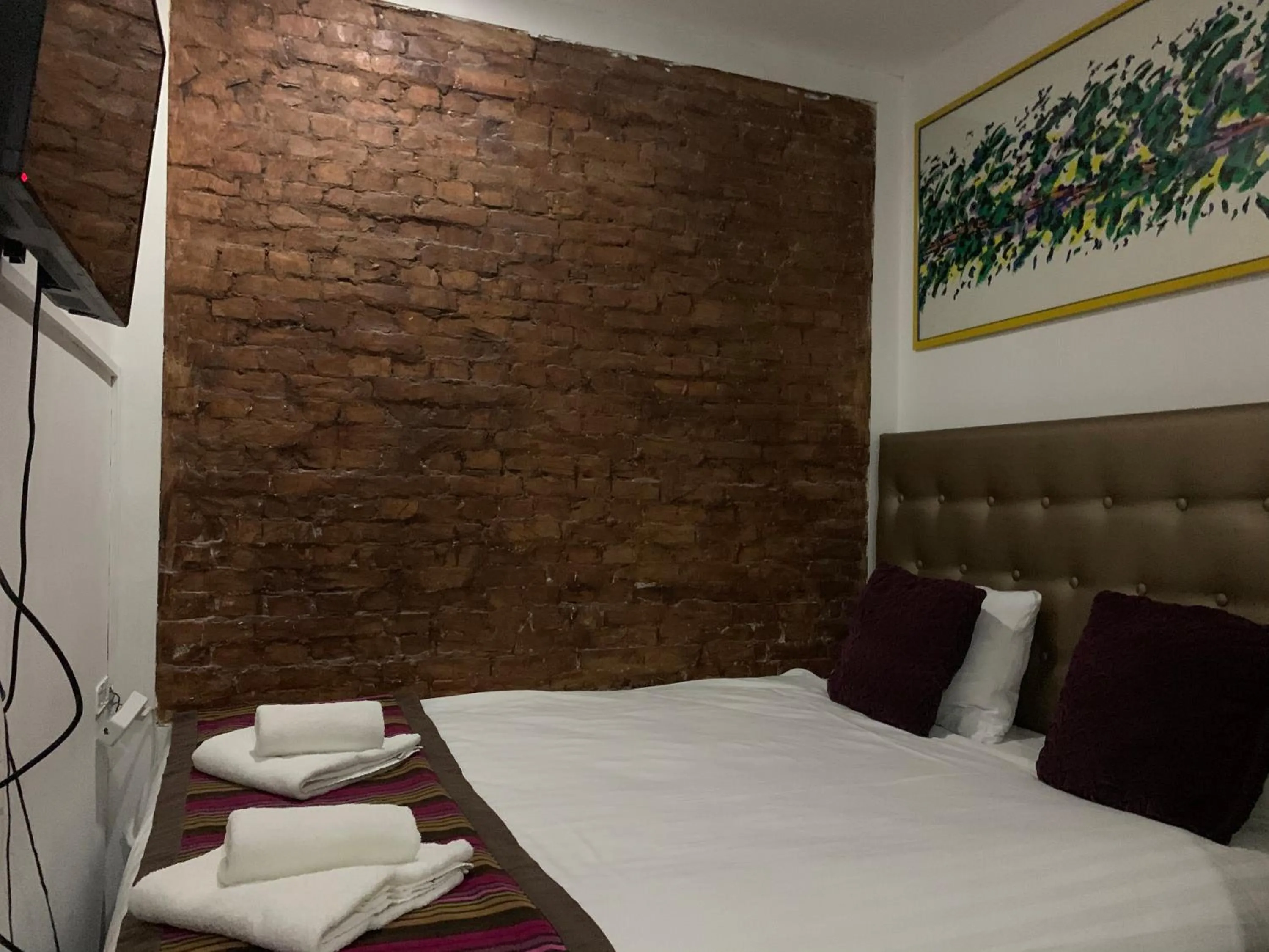 Bed in Hotel La Belle Vue