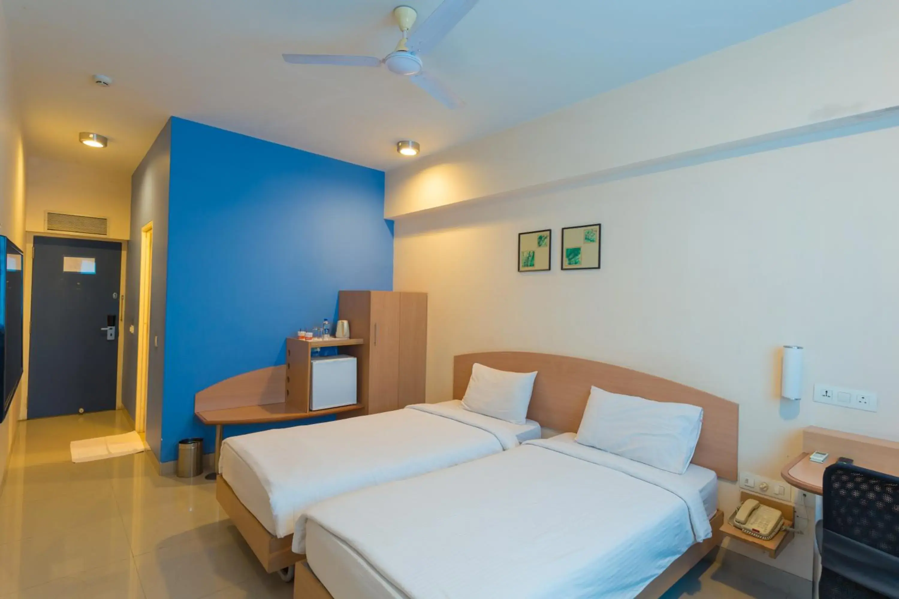 Photo of the whole room, Bed in Ginger Hotel Pune - Pimpri