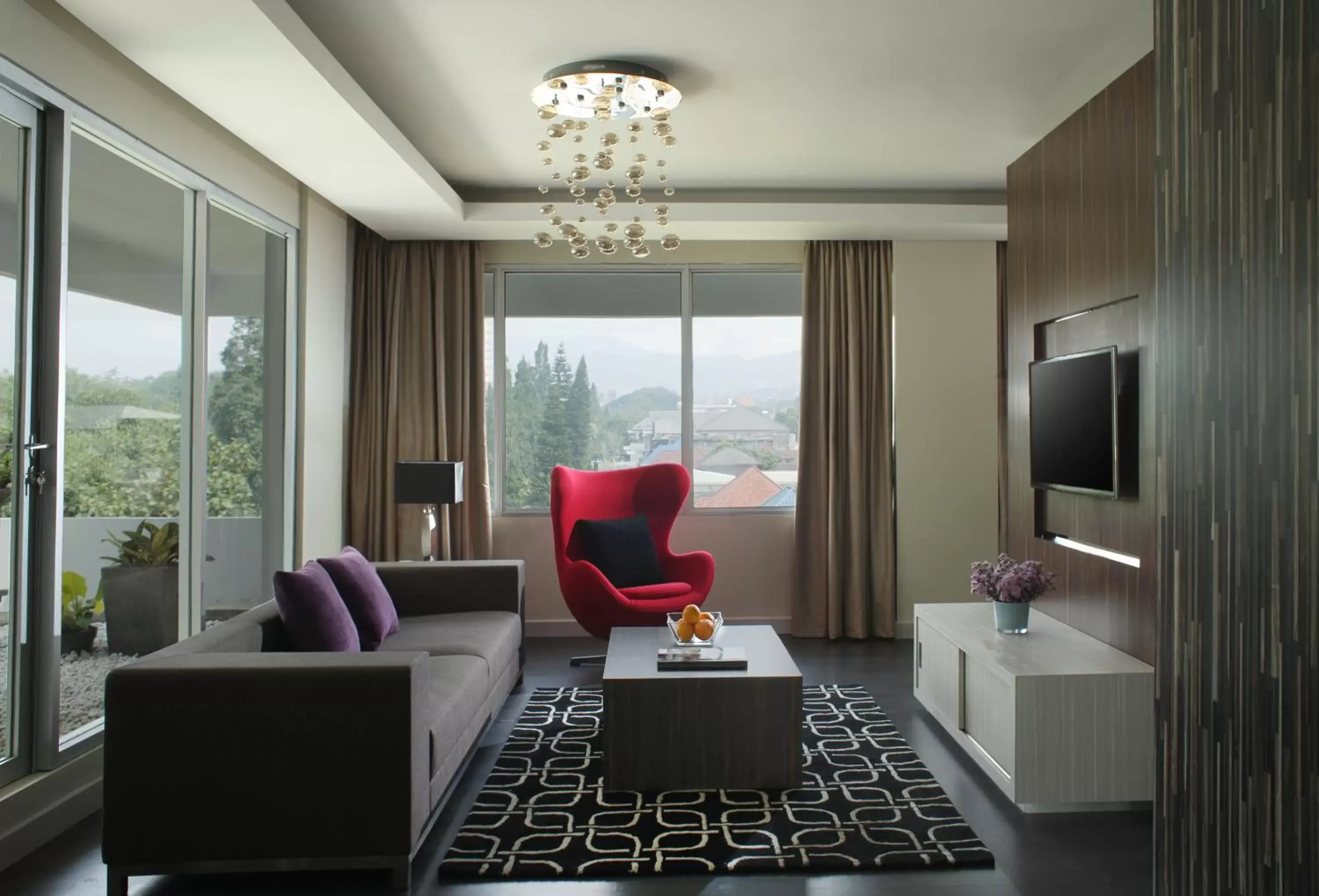 Bed, Seating Area in Patra Bandung Hotel