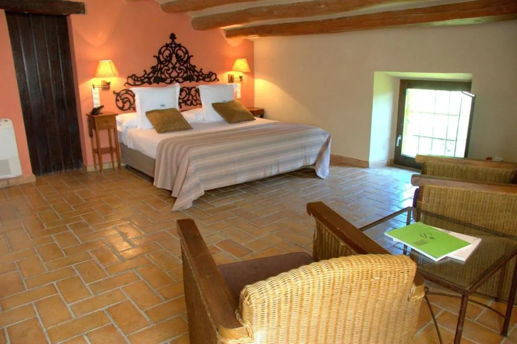 Bed in Mas Salvi Country Boutique Hotel
