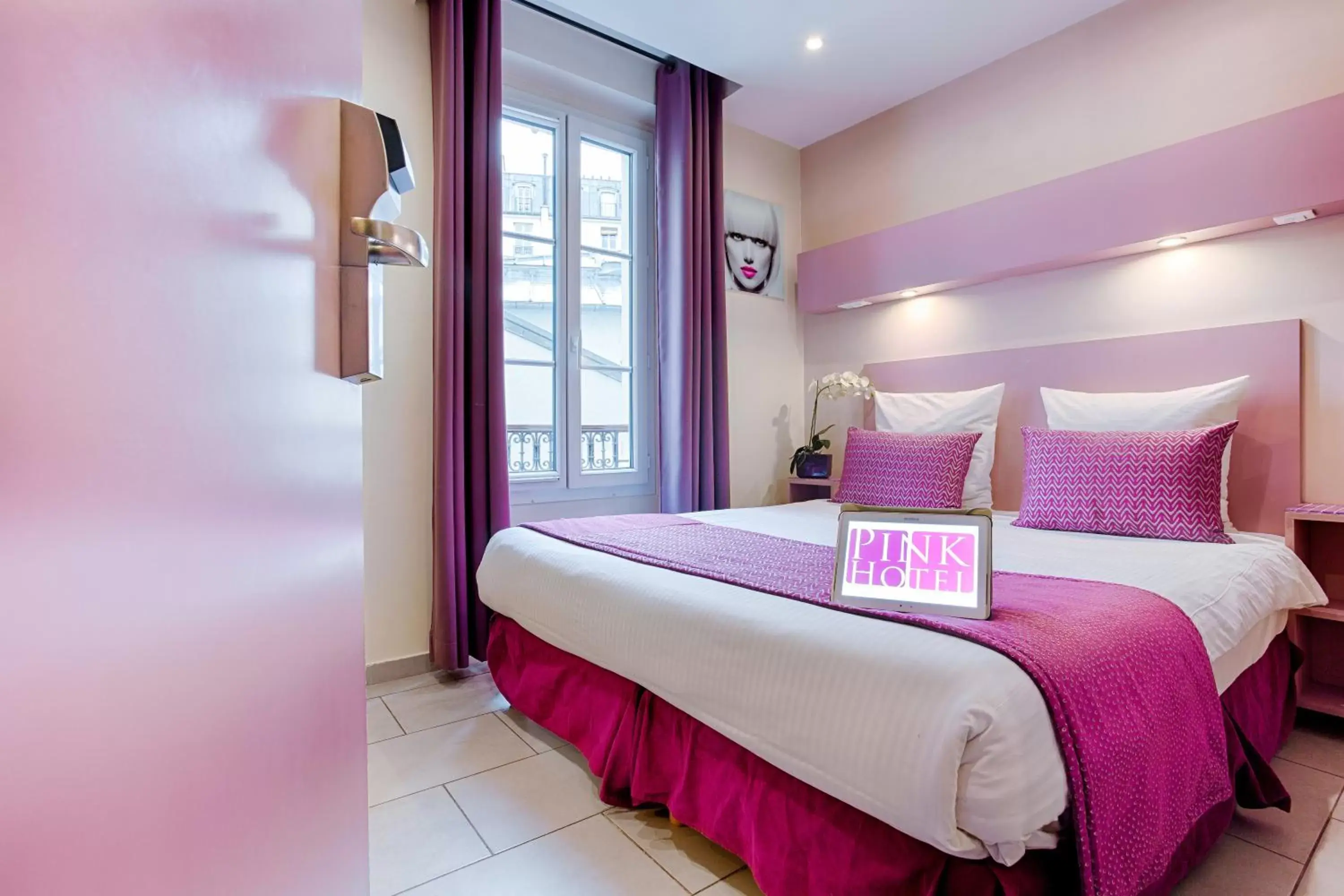 Bed in Pink Hotel