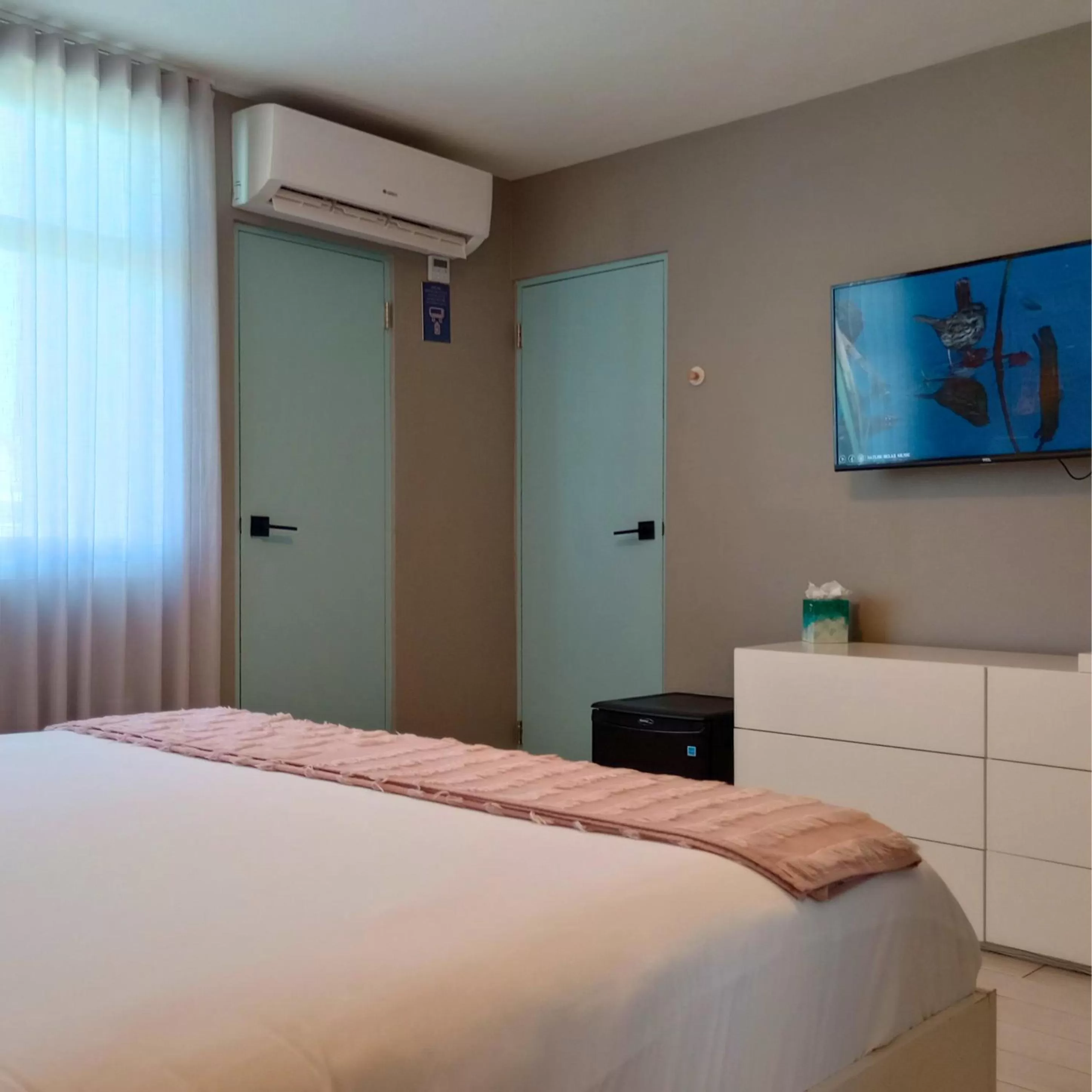 Bed in Trópica Beach Hotel