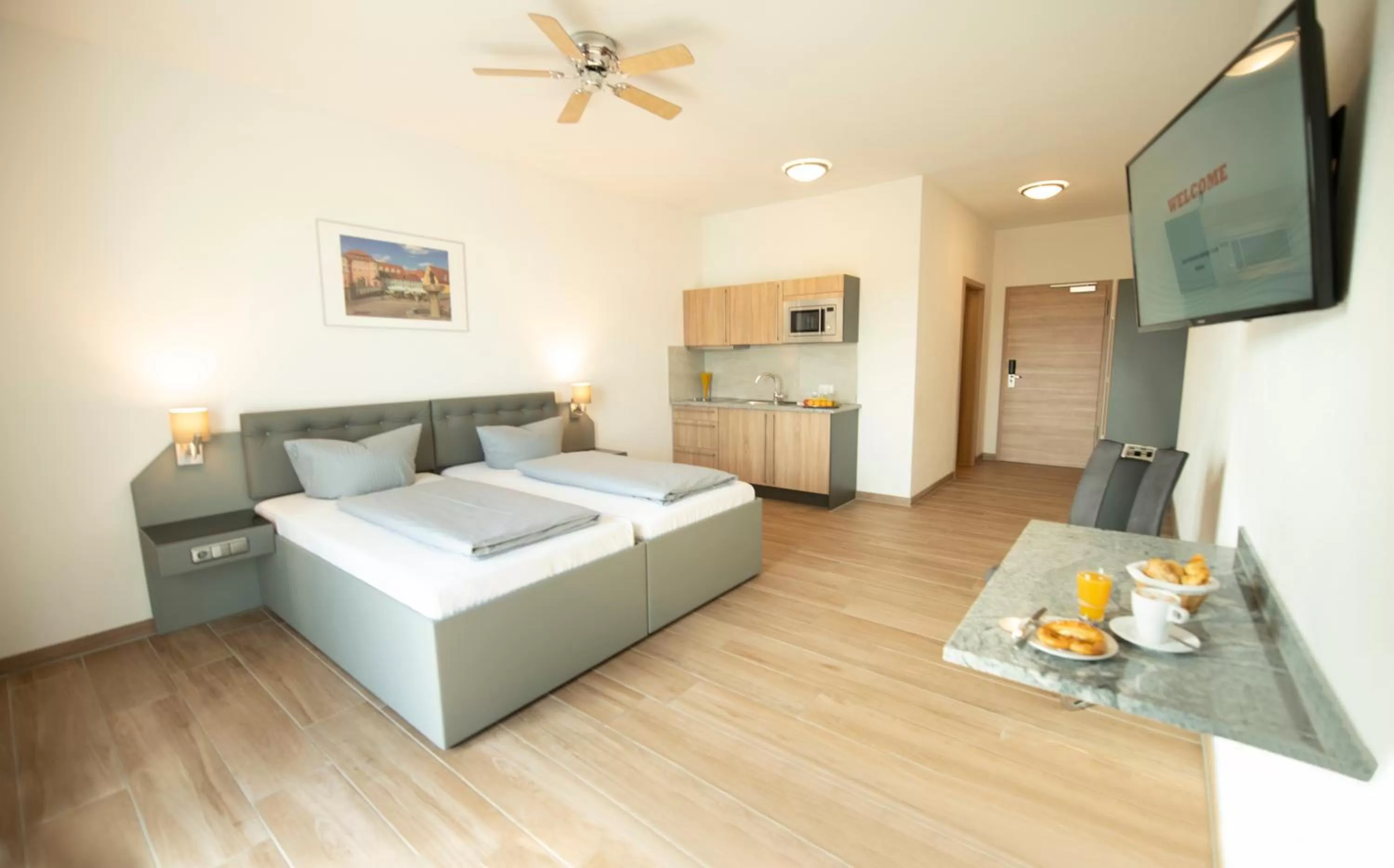 Photo of the whole room, Bed in Stadthotel Donauwörth