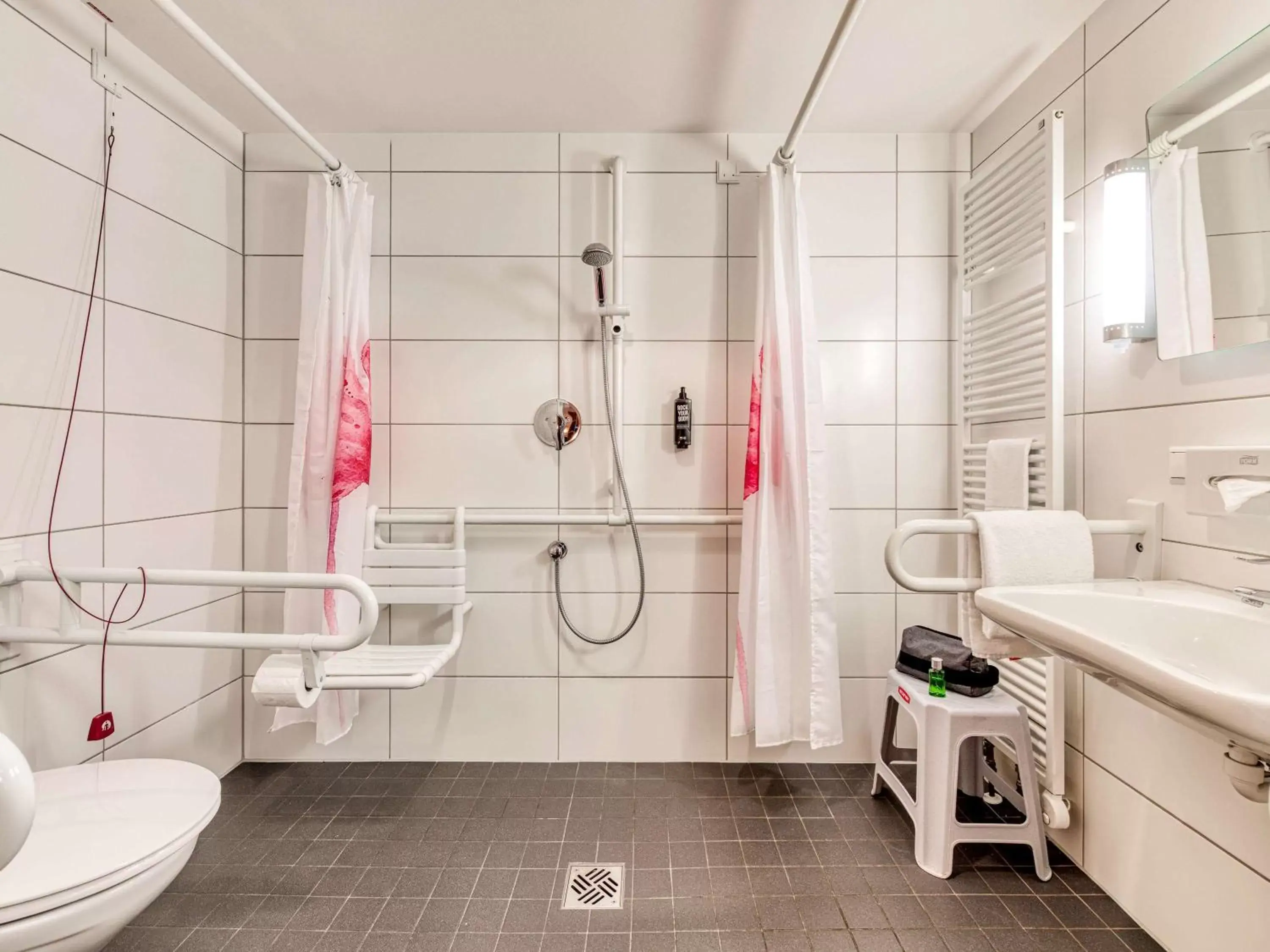 Photo of the whole room, Bathroom in ibis Konstanz