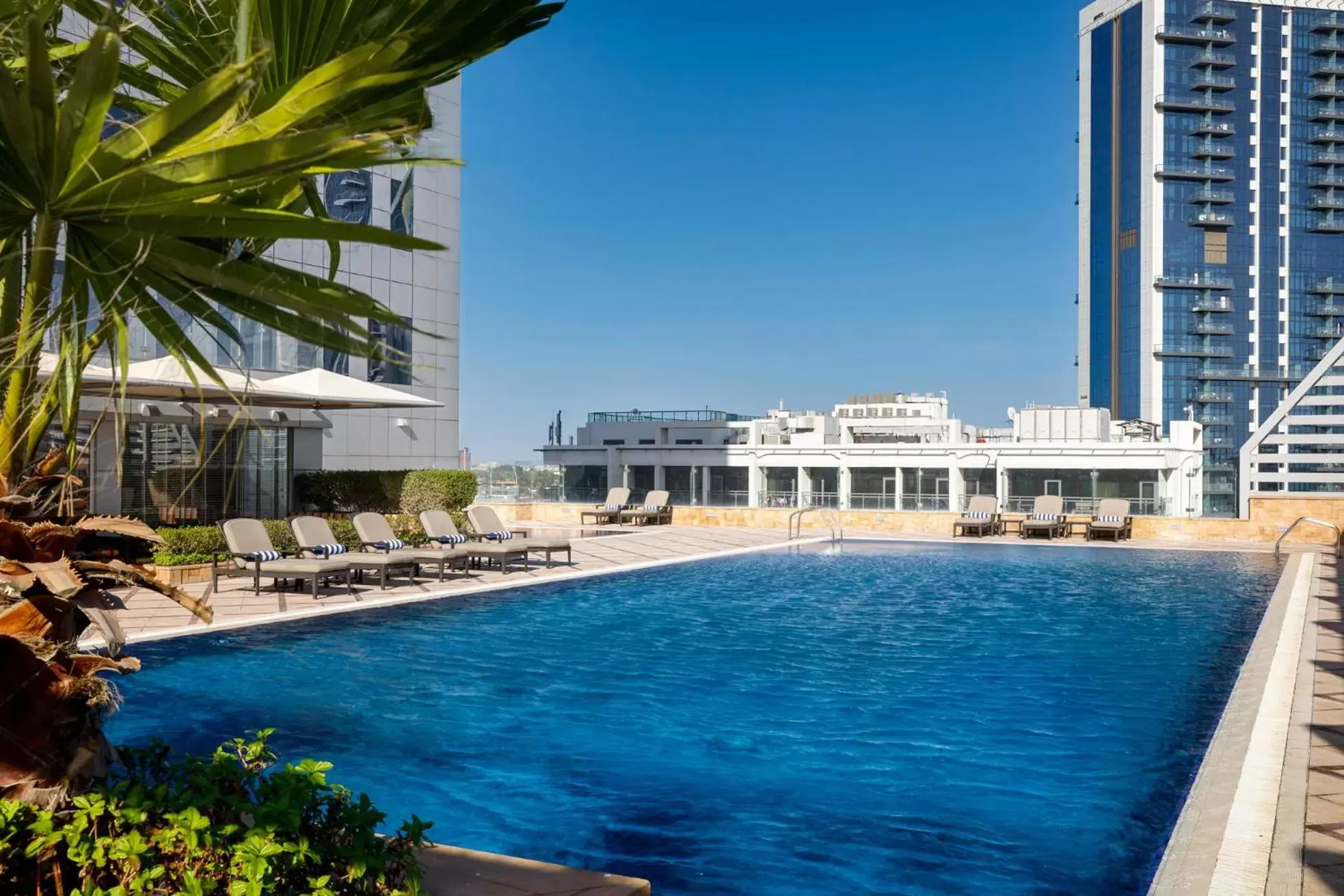 Swimming Pool in La Suite Dubai Hotel & Apartments