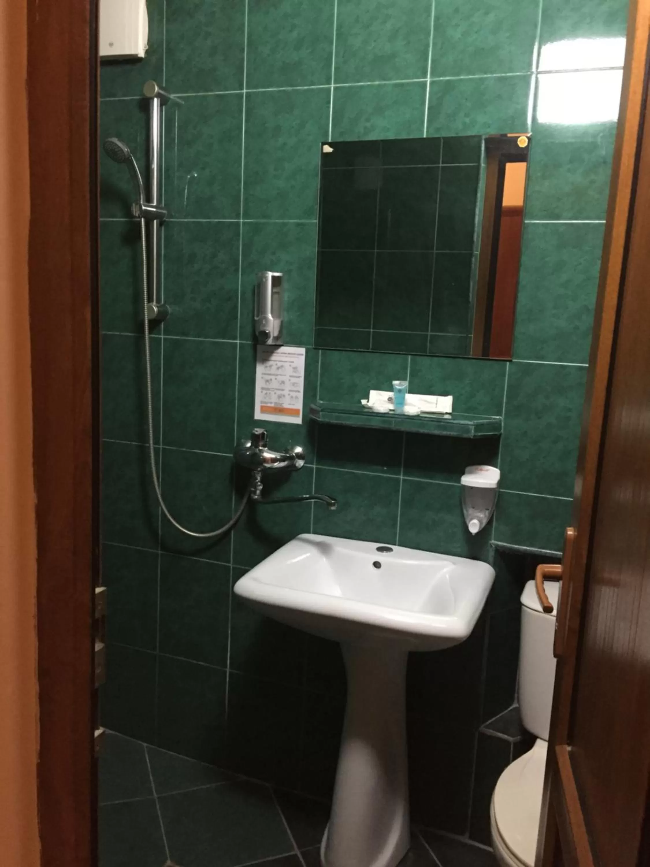 Bathroom in Piano Hotel