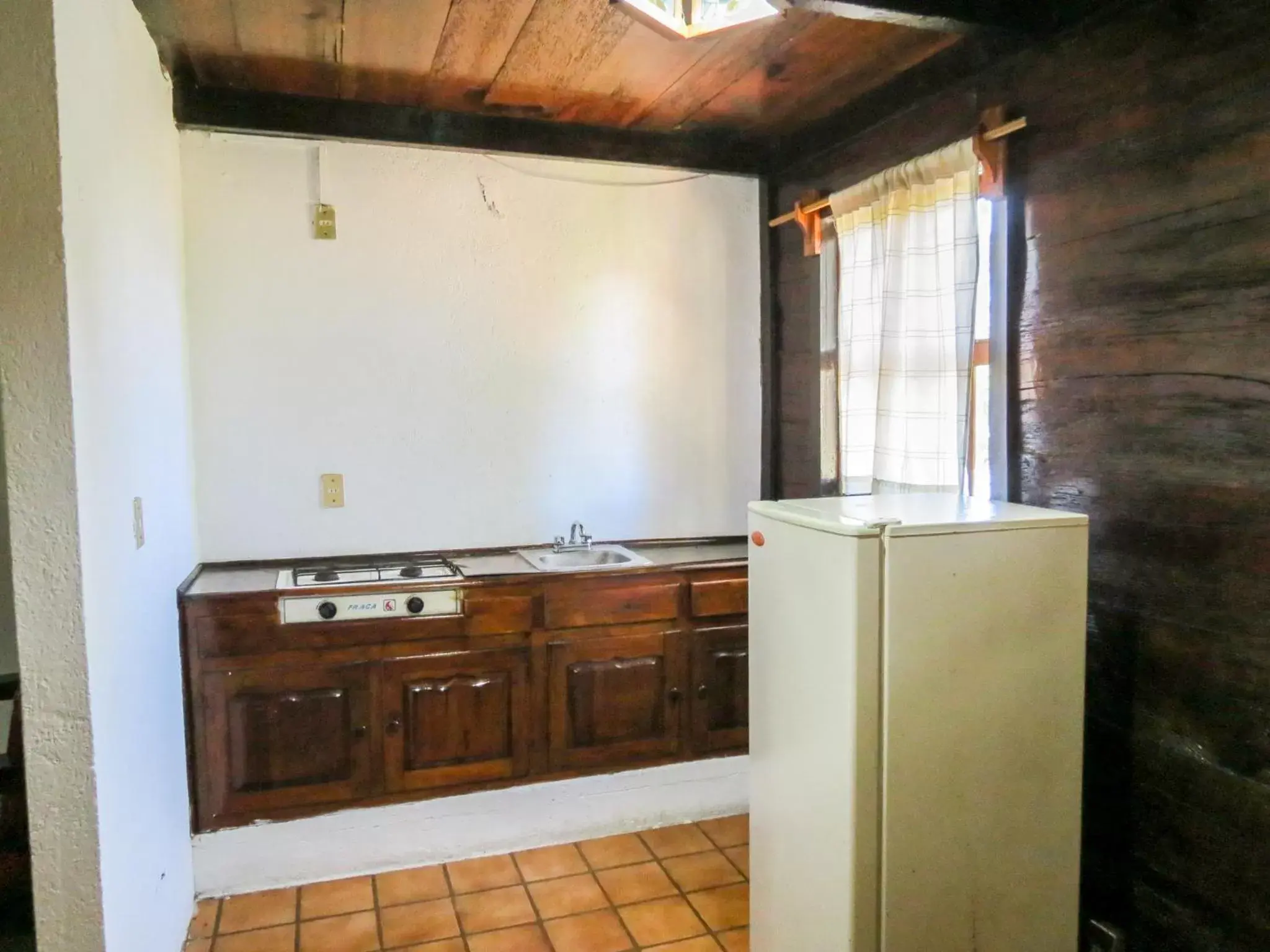 Kitchen/Kitchenette in Cabañas Yunuén by Rotamundos