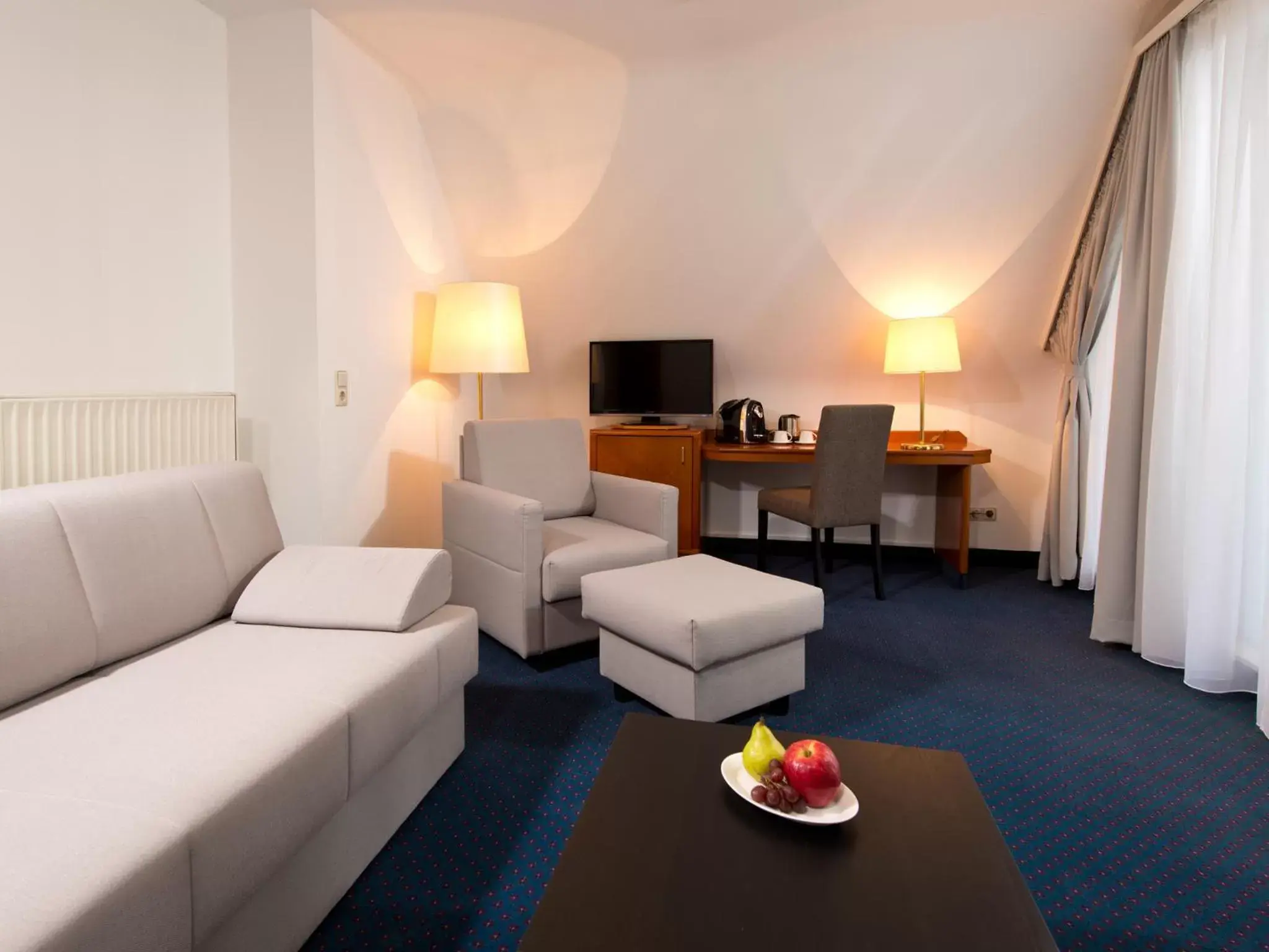 Living room in ACHAT Hotel Neustadt an der Weinstraße Living room in ACHAT Hotel Neustadt an der Weinstraße