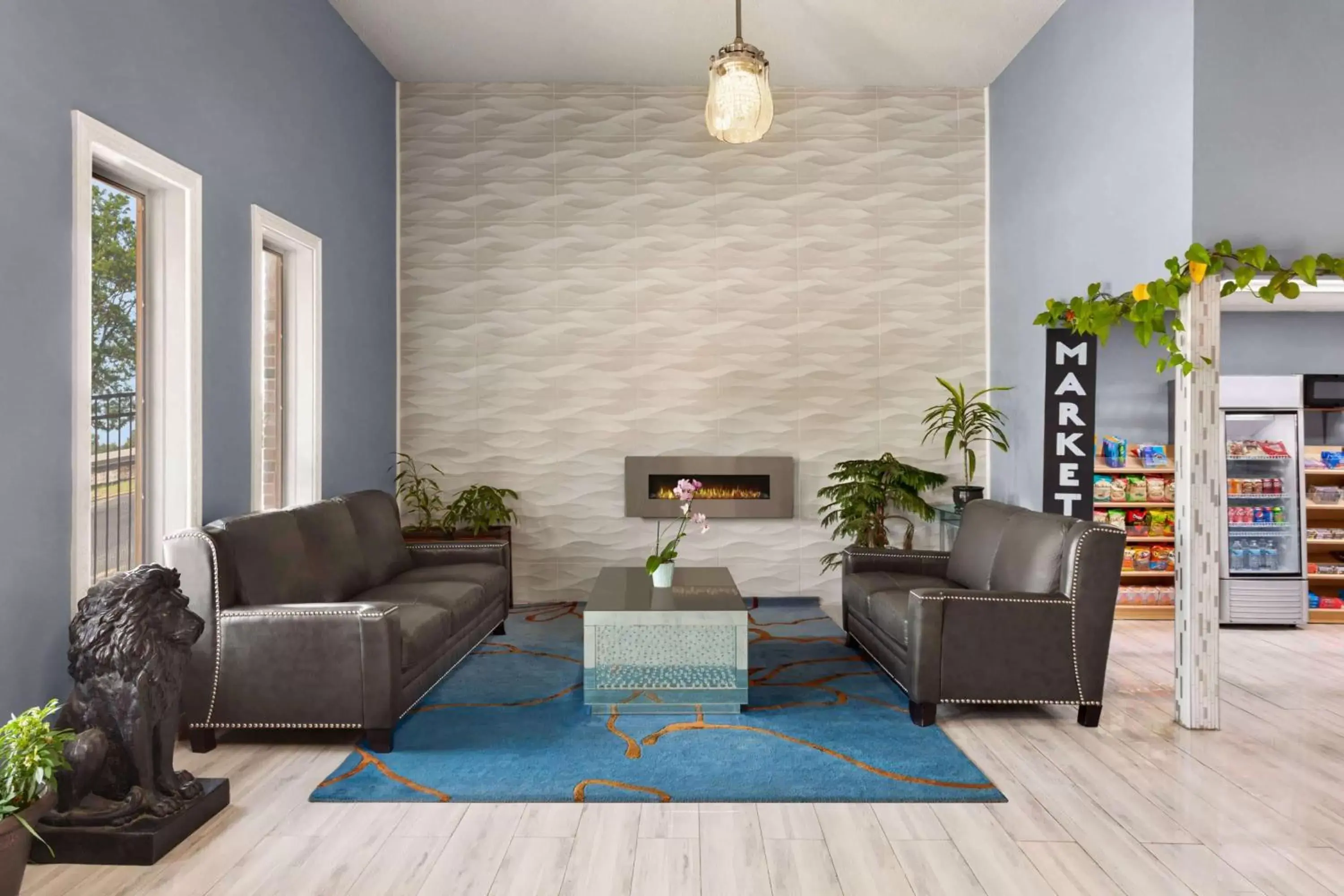 Lobby or reception in Super 8 by Wyndham Lenexa Overland Park Area/Mall Area Lobby or reception in Super 8 by Wyndham Lenexa Overland Park Area/Mall Area