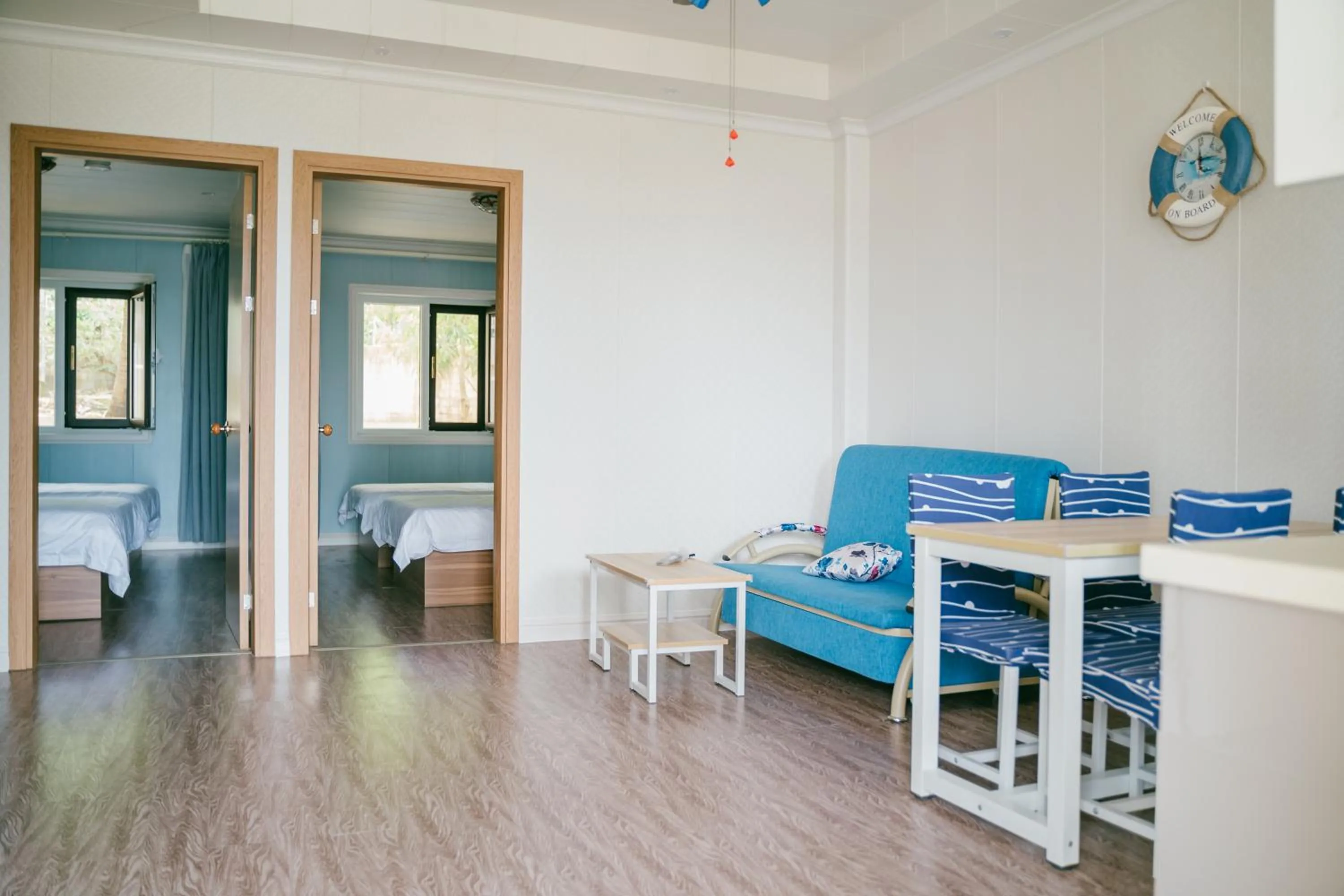Living room, Bed in Saipan Emerald Villa