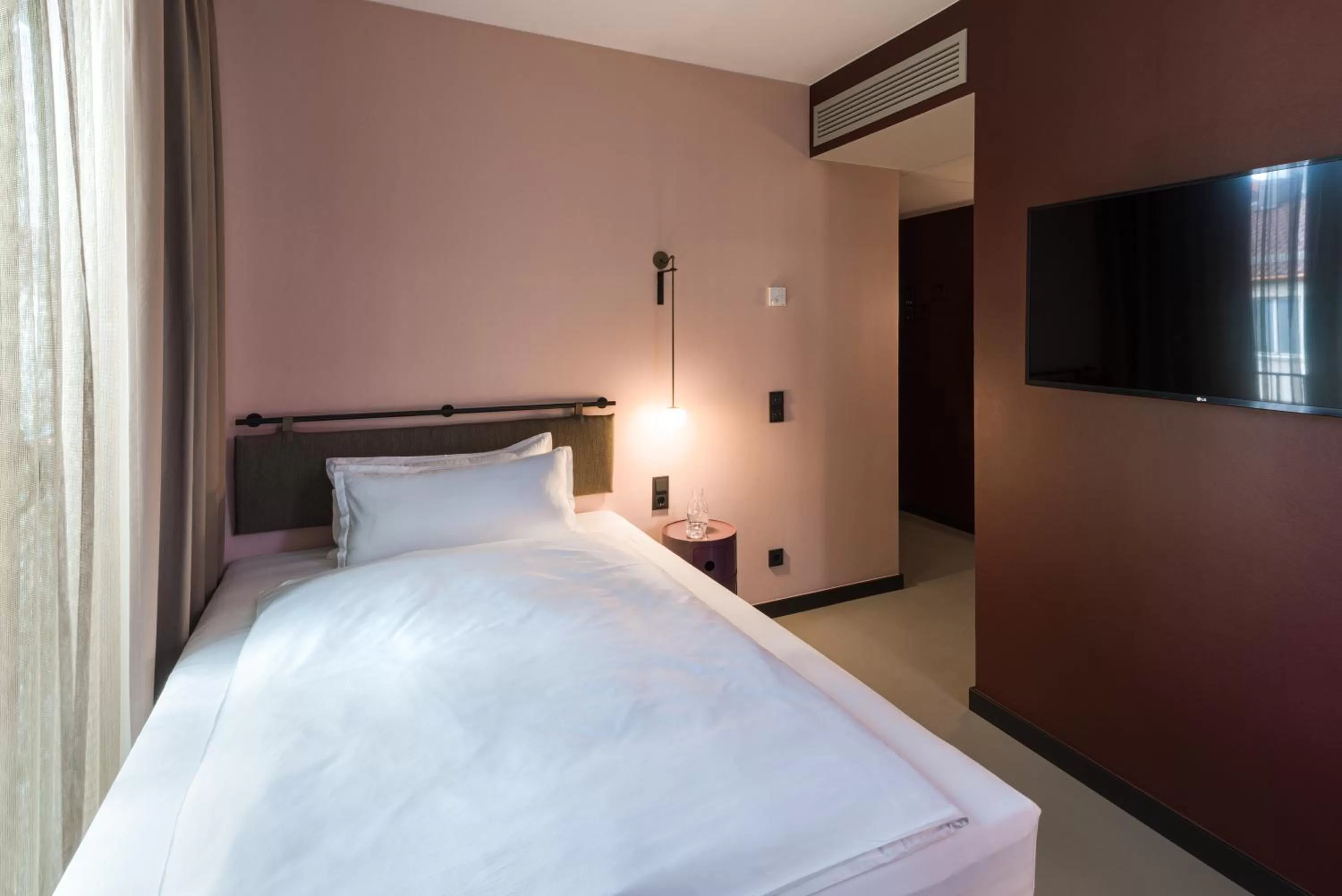 Bed in EmiLu Design Hotel