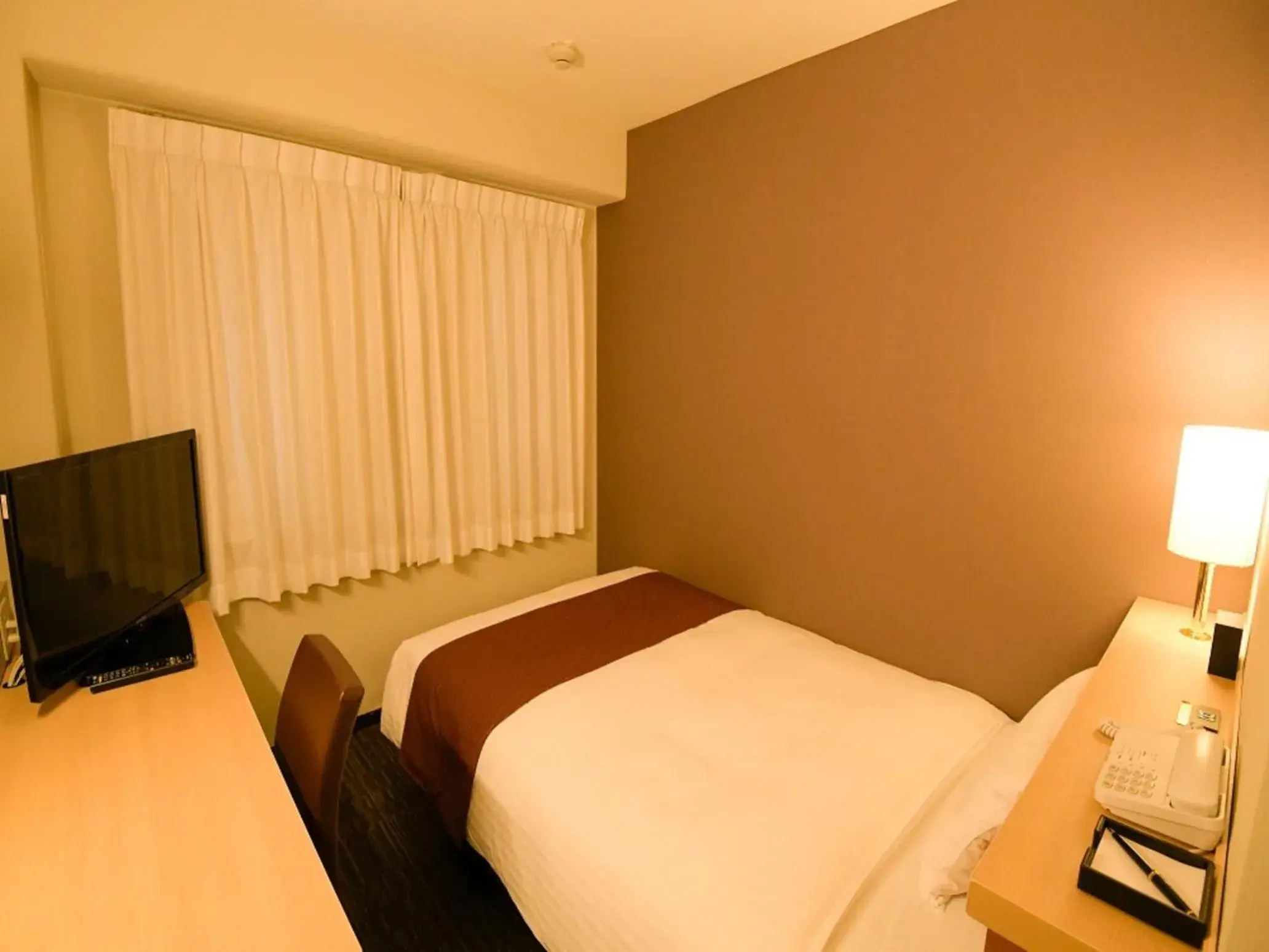 Bed in VIA INN SHIN OSAKA WEST - JR WEST GROUP