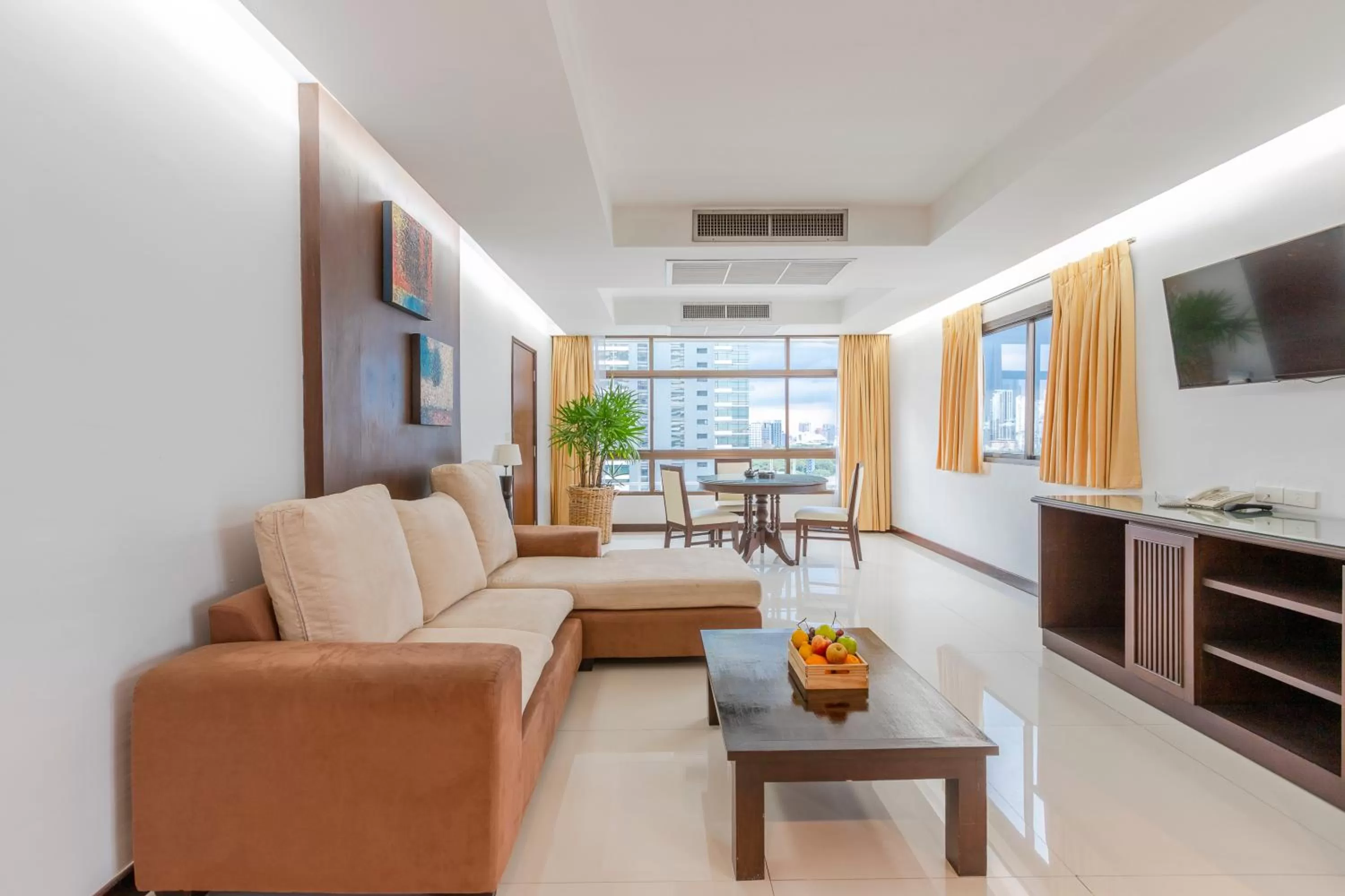 Living room in Pinnacle Lumpinee Park Hotel