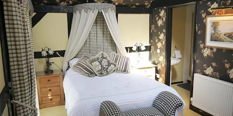 Bed in The Old Priory B&B