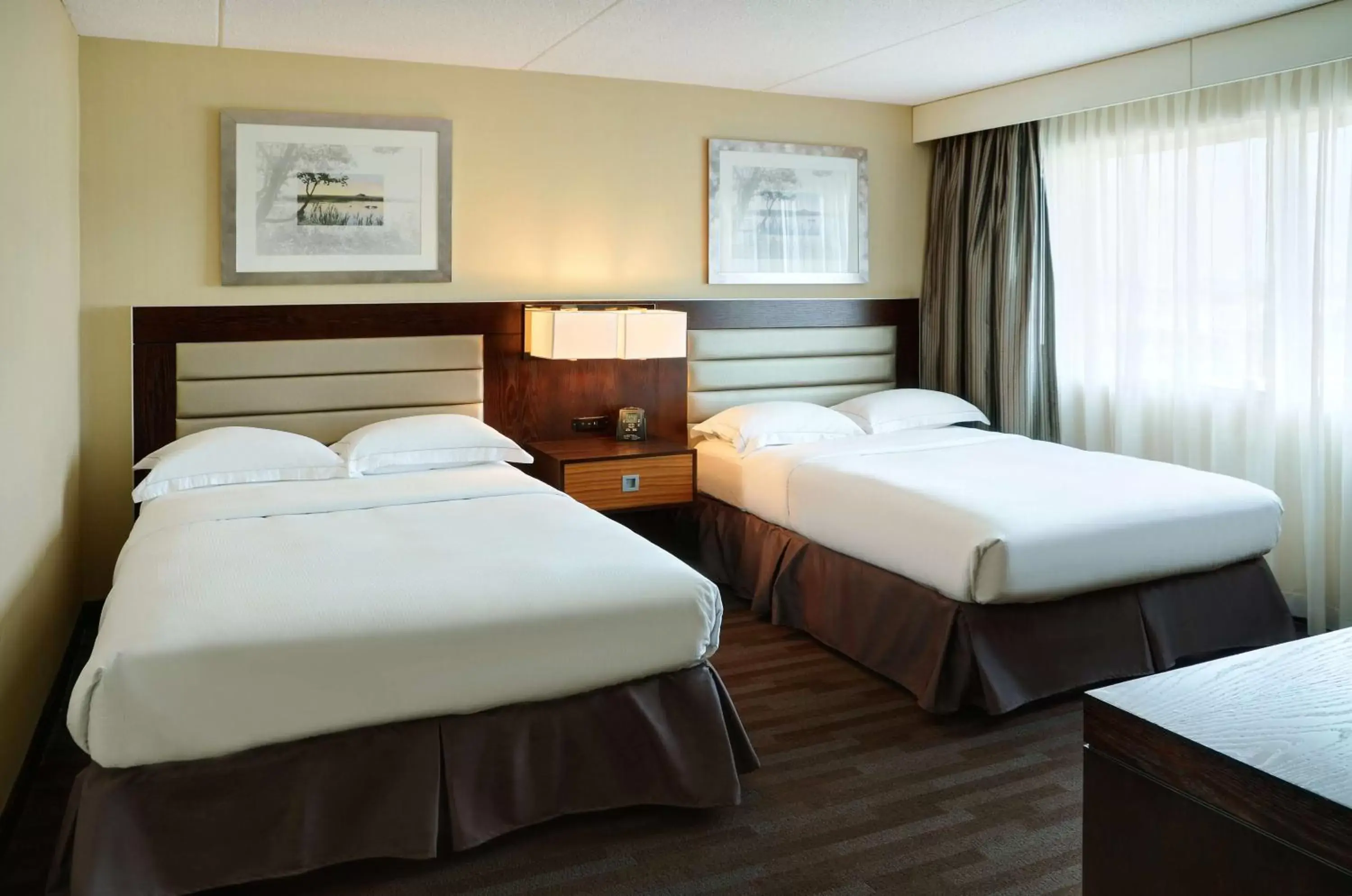 Bed in Hilton Winnipeg Airport Suites