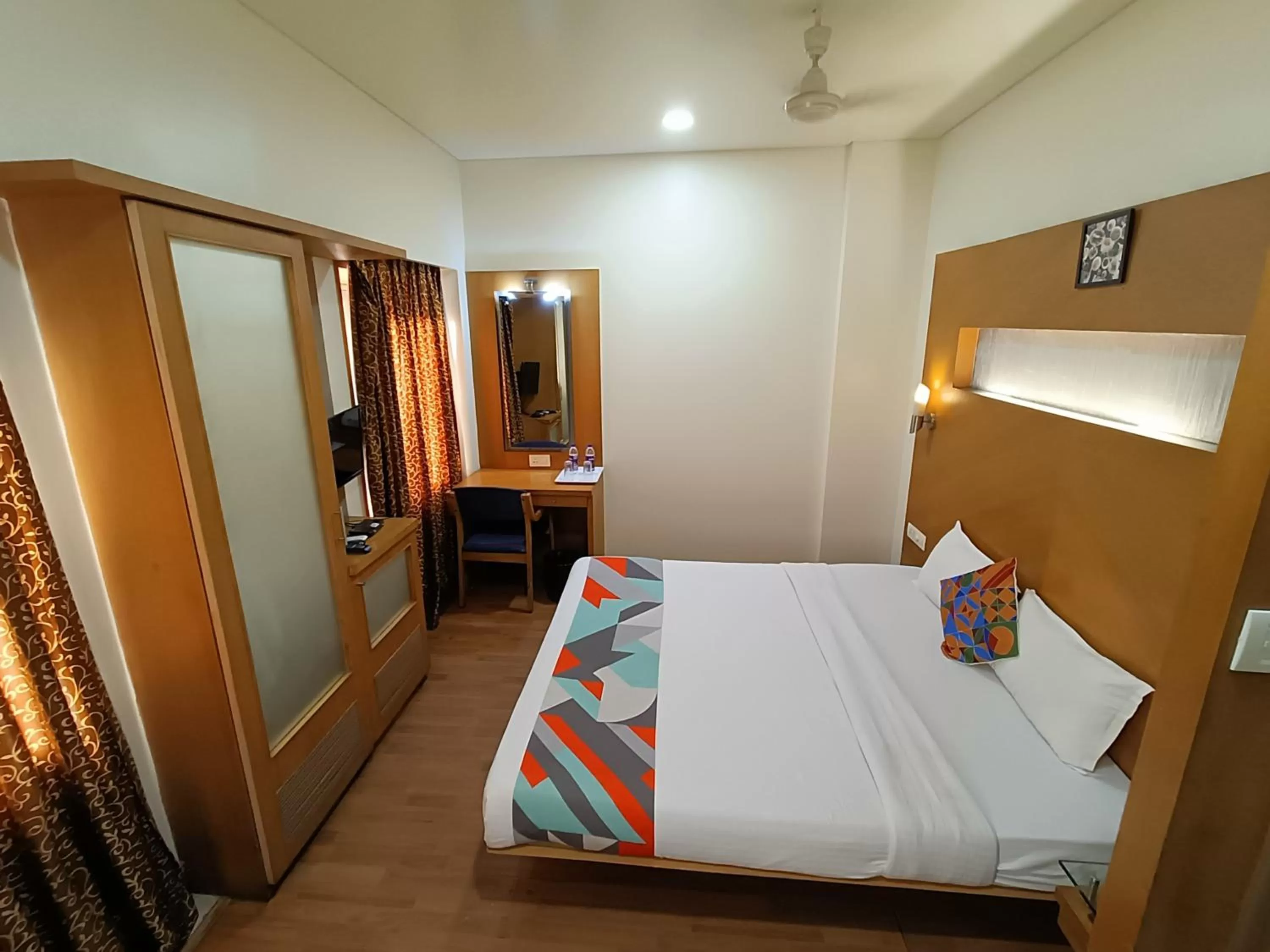 Bed in Rapid Lakme Executive Hotel